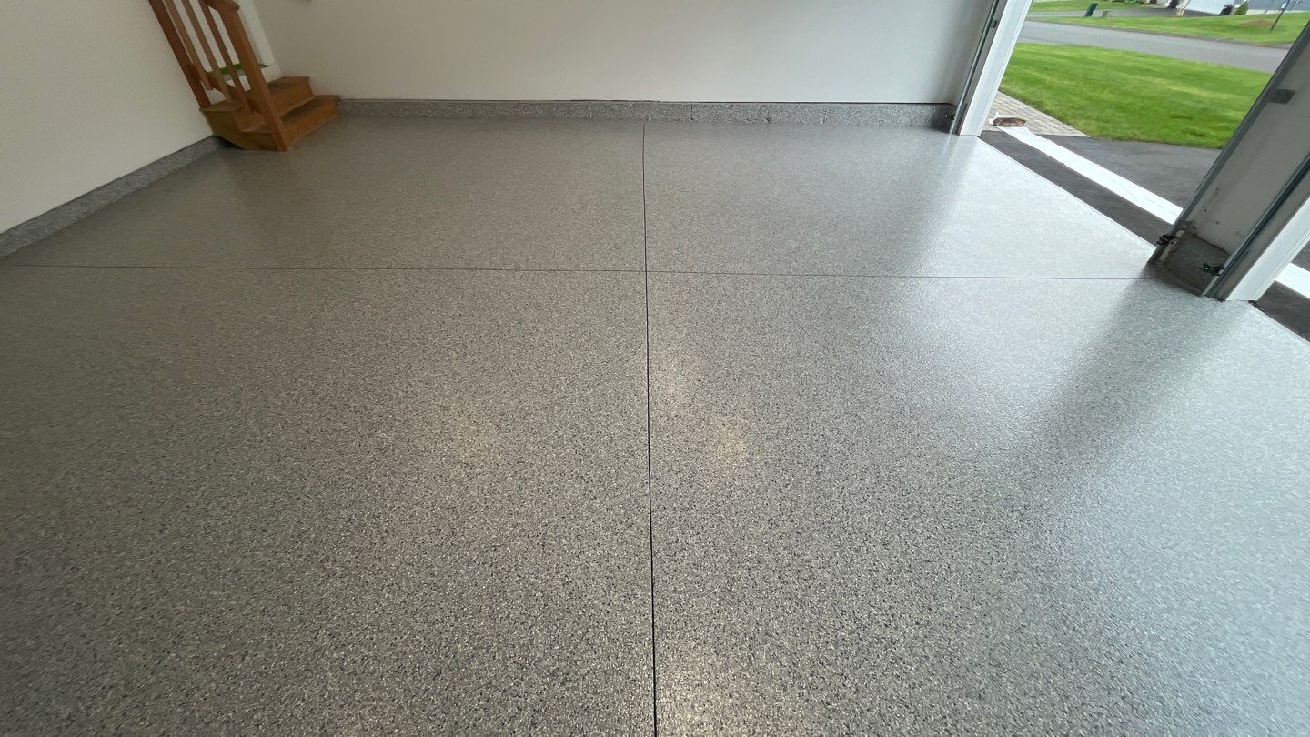 Garage in Londonderry, NH 03053 by Symphony Concrete Coatings
