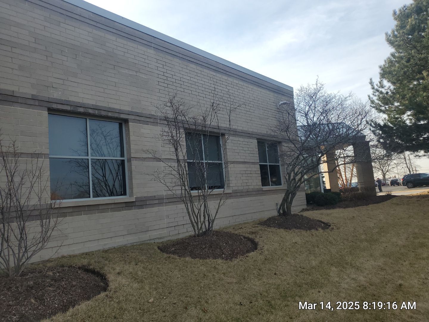 Commercial Facade cleaning using Algaecide, soft wash soap by Northern Power Washing LLC.