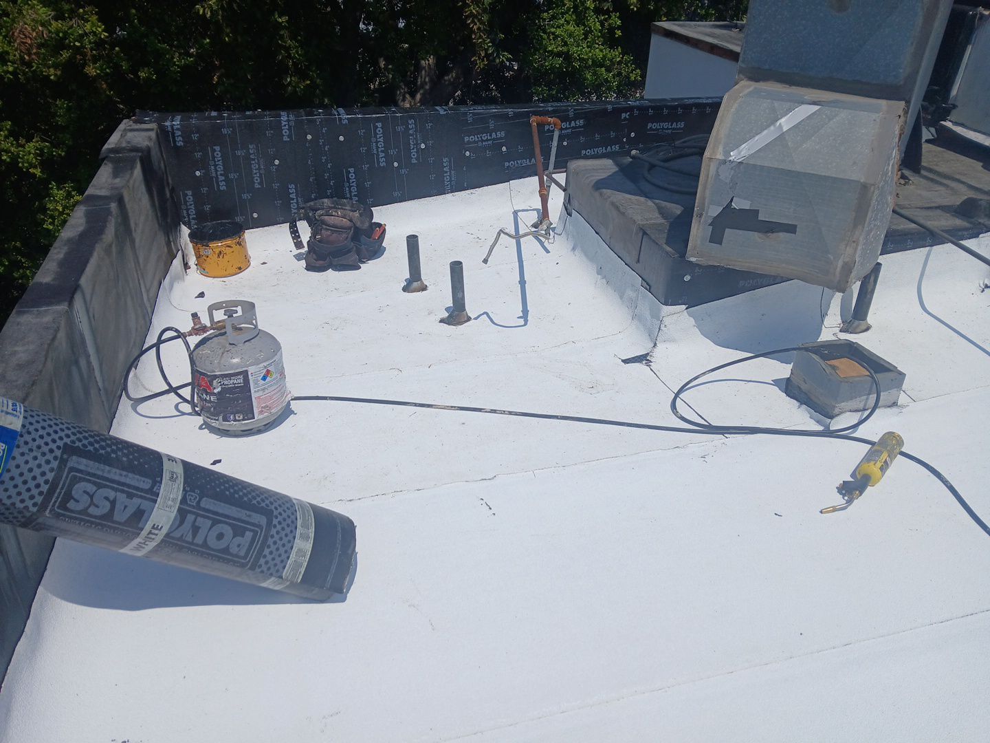 Residential Roofing Installation using Polyglass Torch Down Roofing System by Hull Brothers Roofing