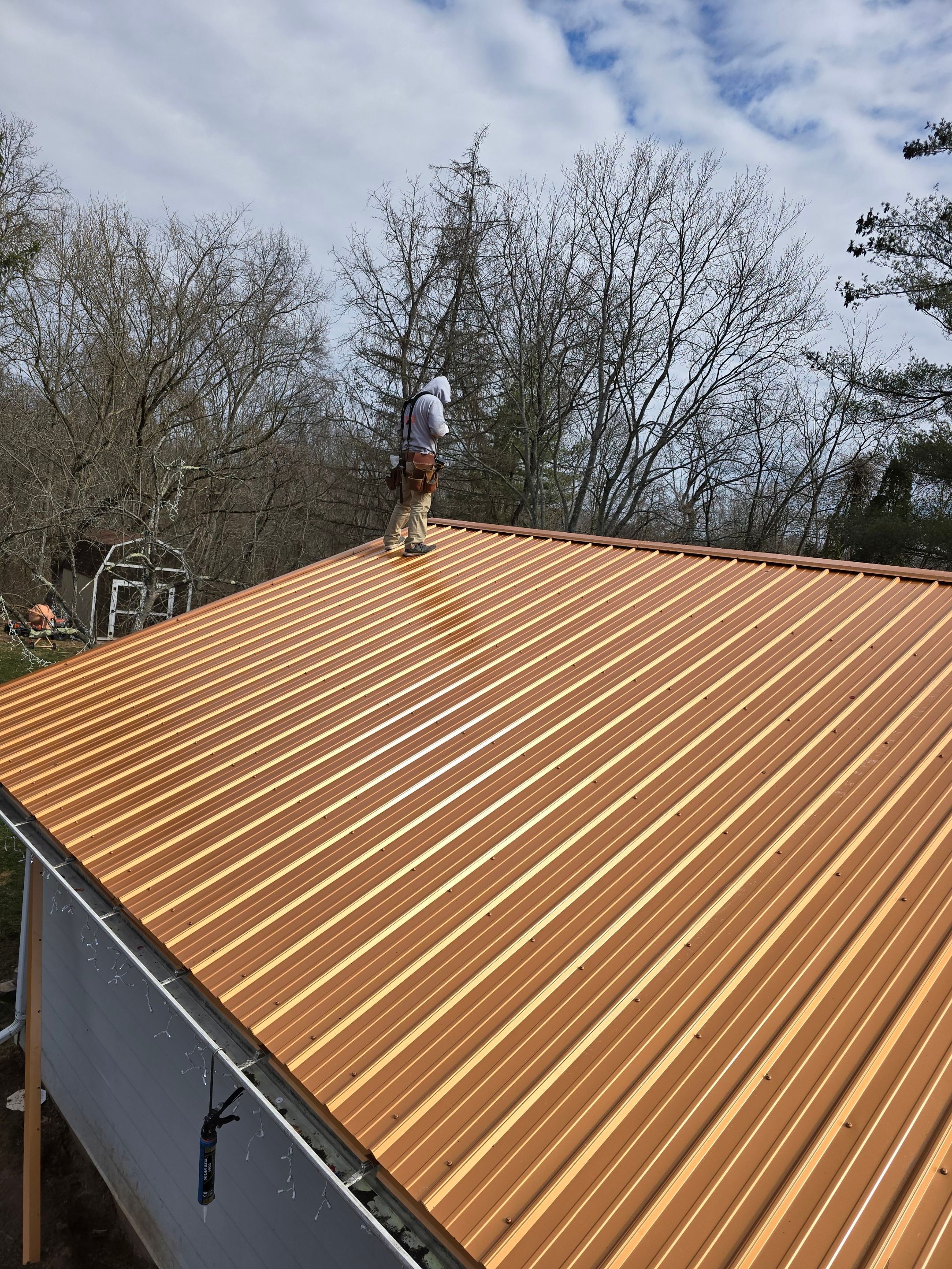 Residential Roofing Installation using Metal by Rainstoppers Roofing