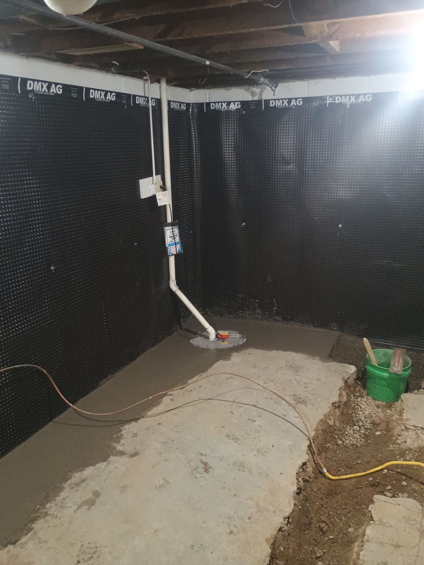 Interior Drain Tile & Yard French Drain in St. Paul, MN by Waterproofing Northeast
