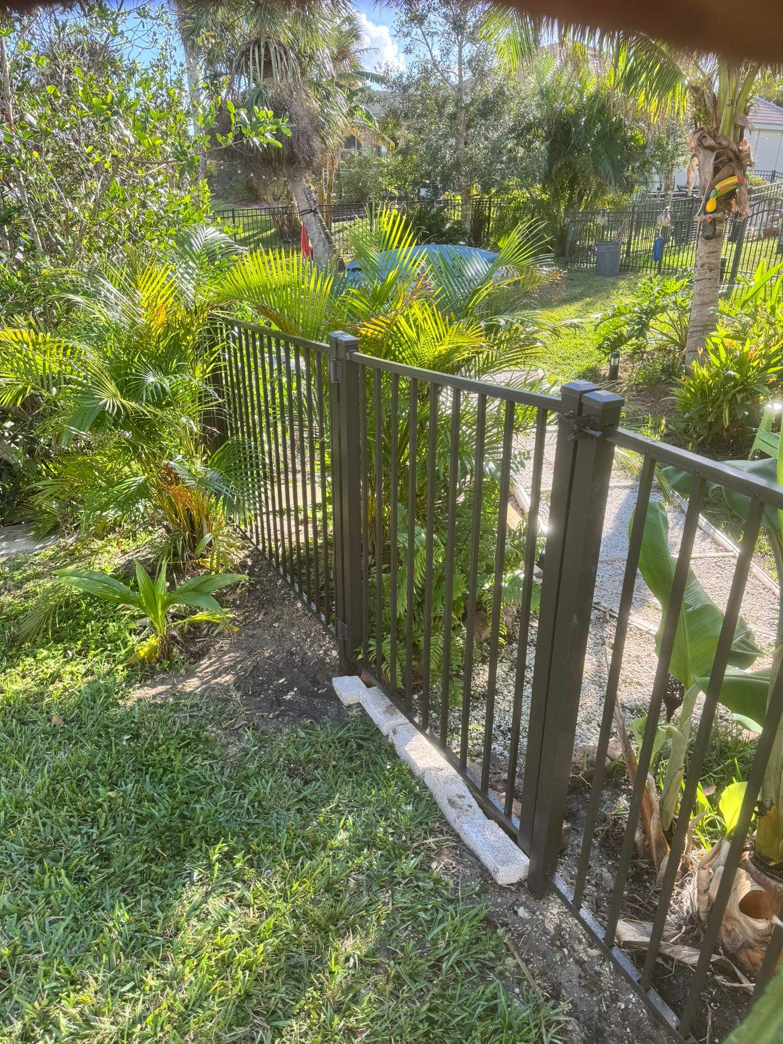 Bronze Aluminum Picket Fence Installation in Port Charlotte by True Fence LLC