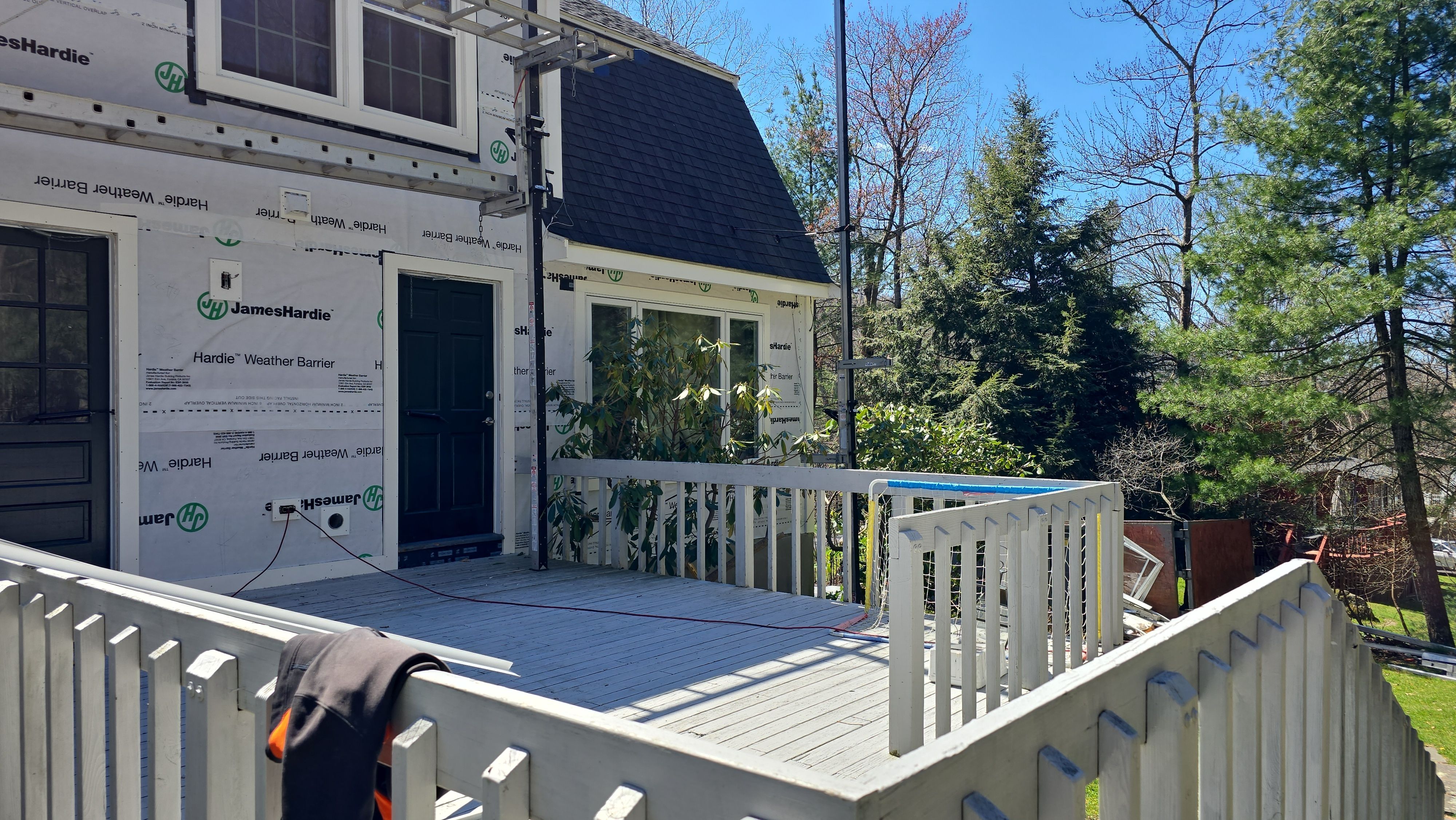 Custom window trim work and siding replacement in Dover, MA by UBrothers Construction