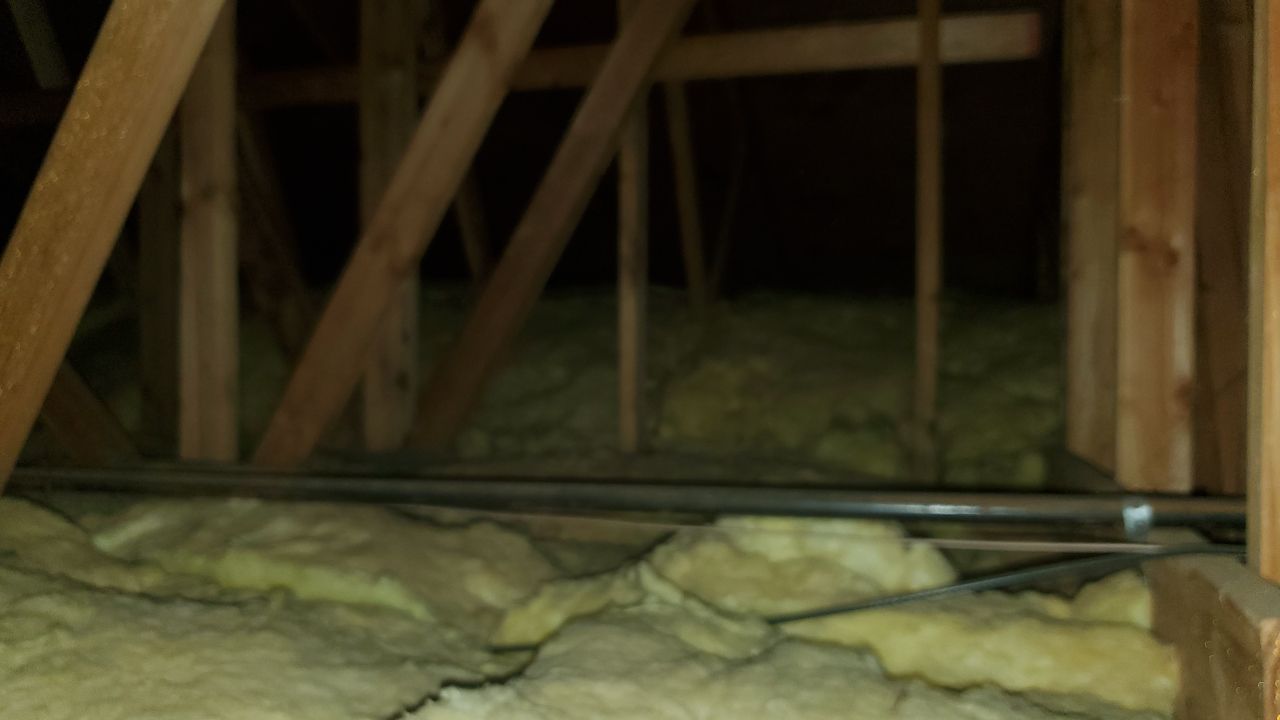 Attic Insulation, Roofing, and Solar for this in-town home by Byers Enterprises 
