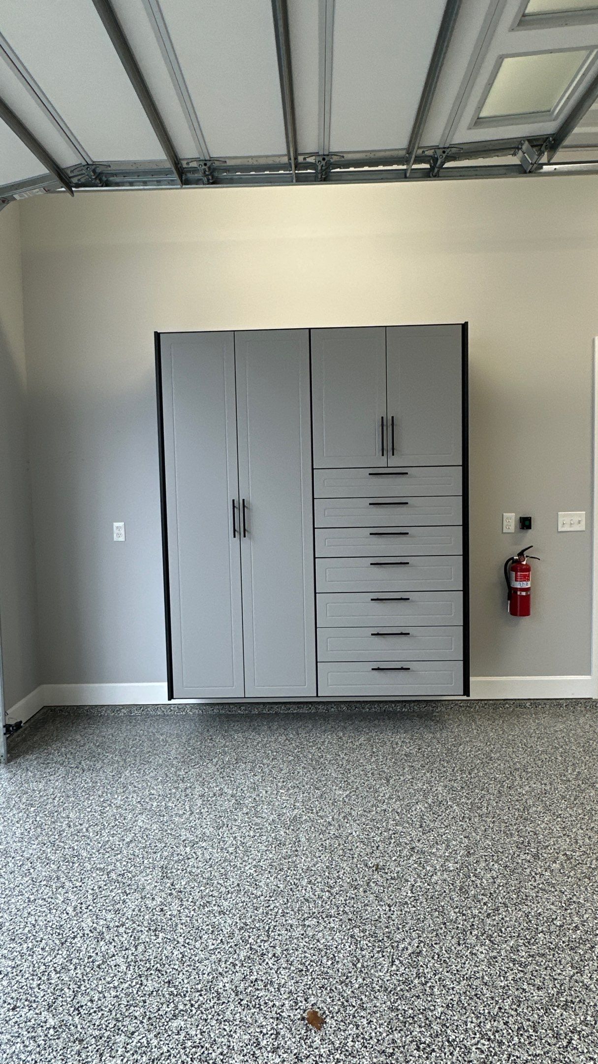 Pat F upgraded his garage with a cool Two-tone cabinet setup by Banner Garage