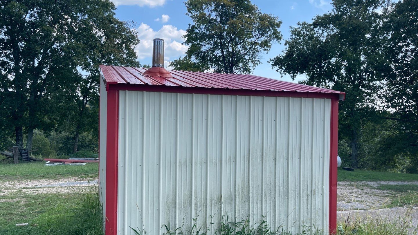 Residential Roofing Install - 29 Gauge G-Rib Metal - Color Brown & Crimson Red by Titan Commercial & Residential Roofing