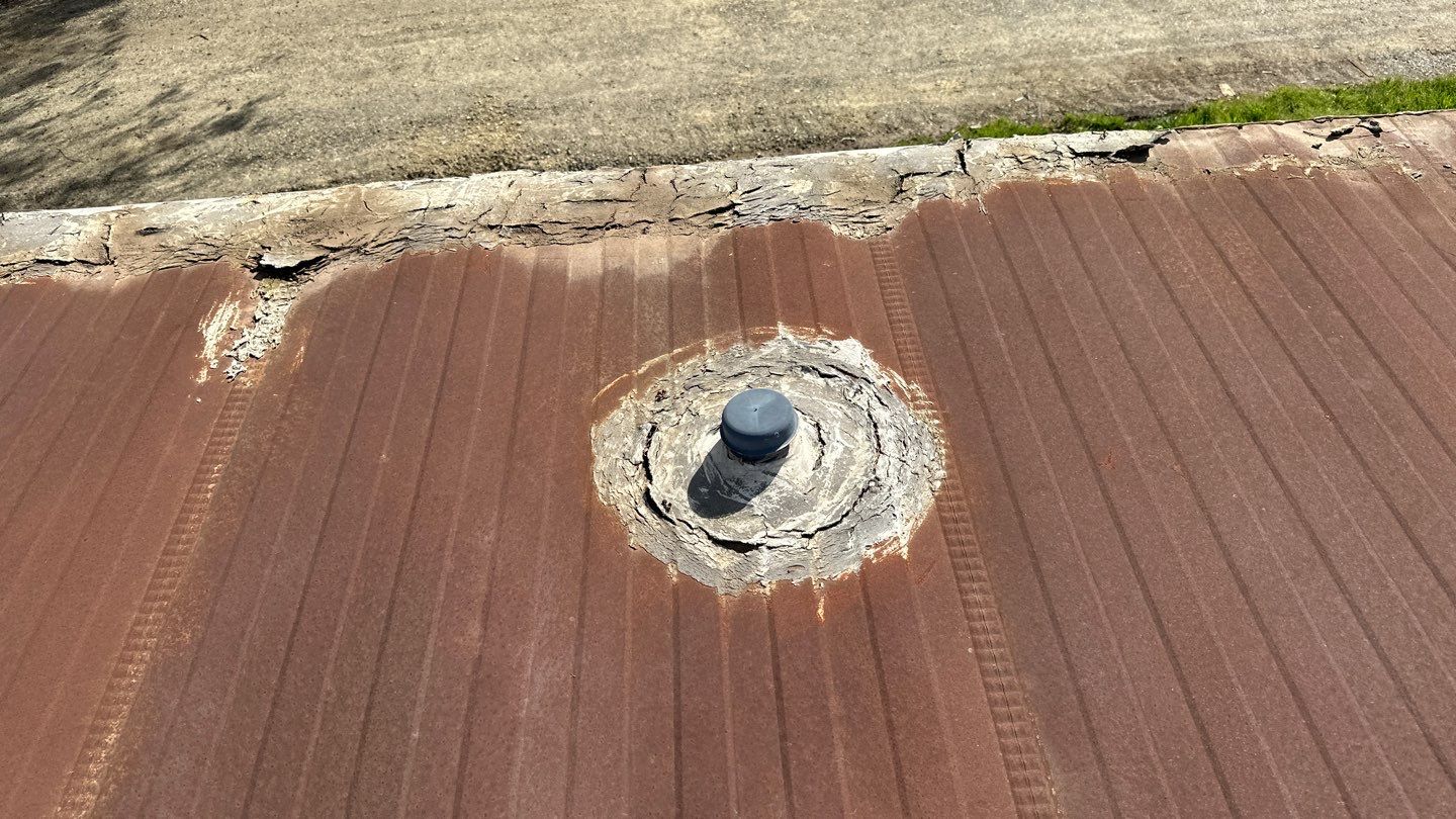 Foam and coatings on mobile home by Straight Edge Roofing Inc