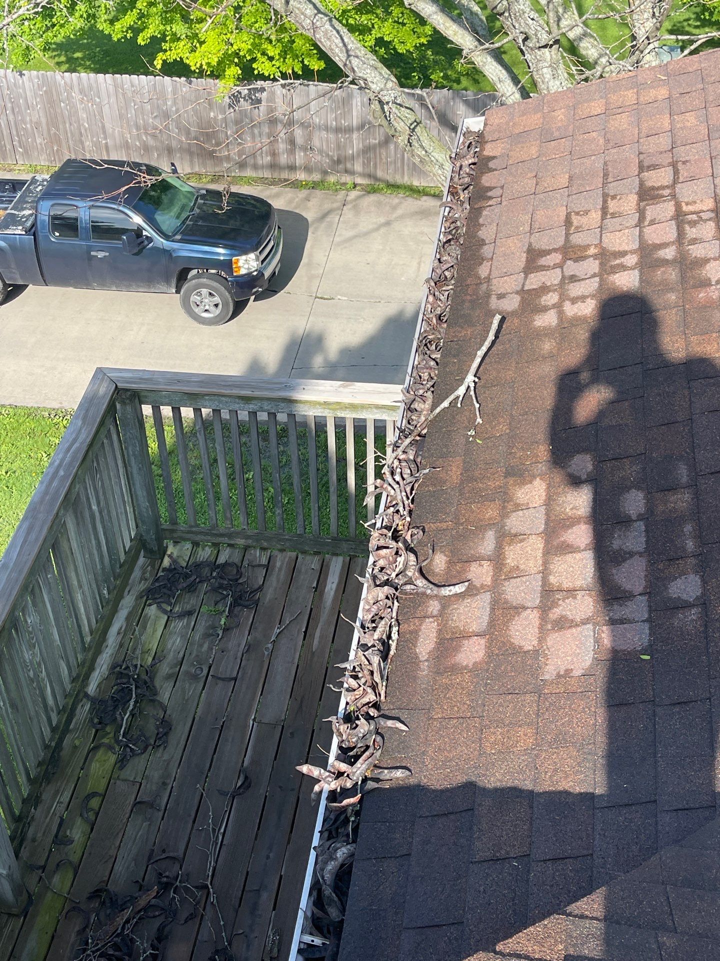 Commercial gutter cleaning Champaign & Urbana before photo with filled gutters