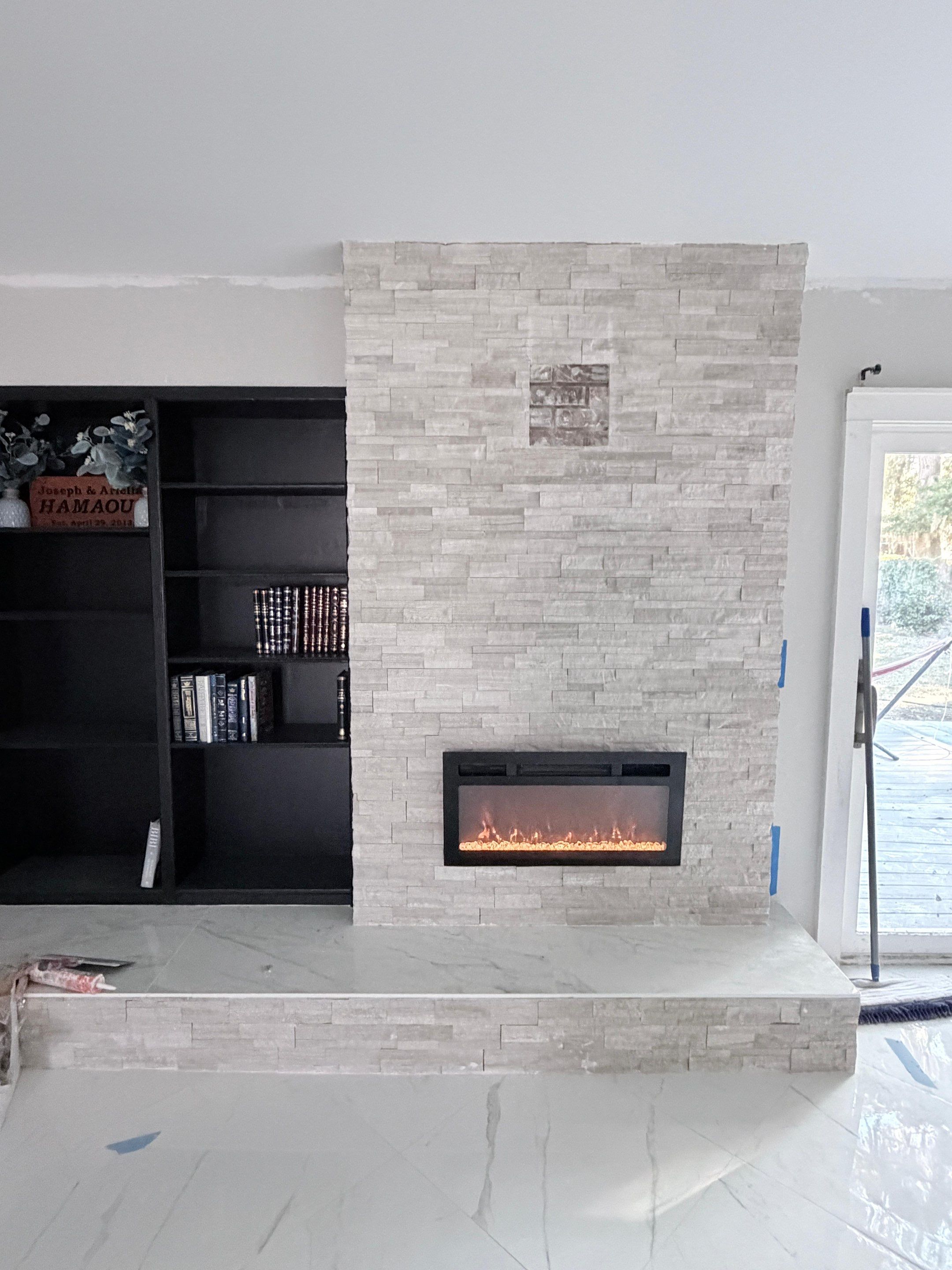 Master Bathroom, Children's Bathroom, and Fireplace Renovation by urban green energy llc