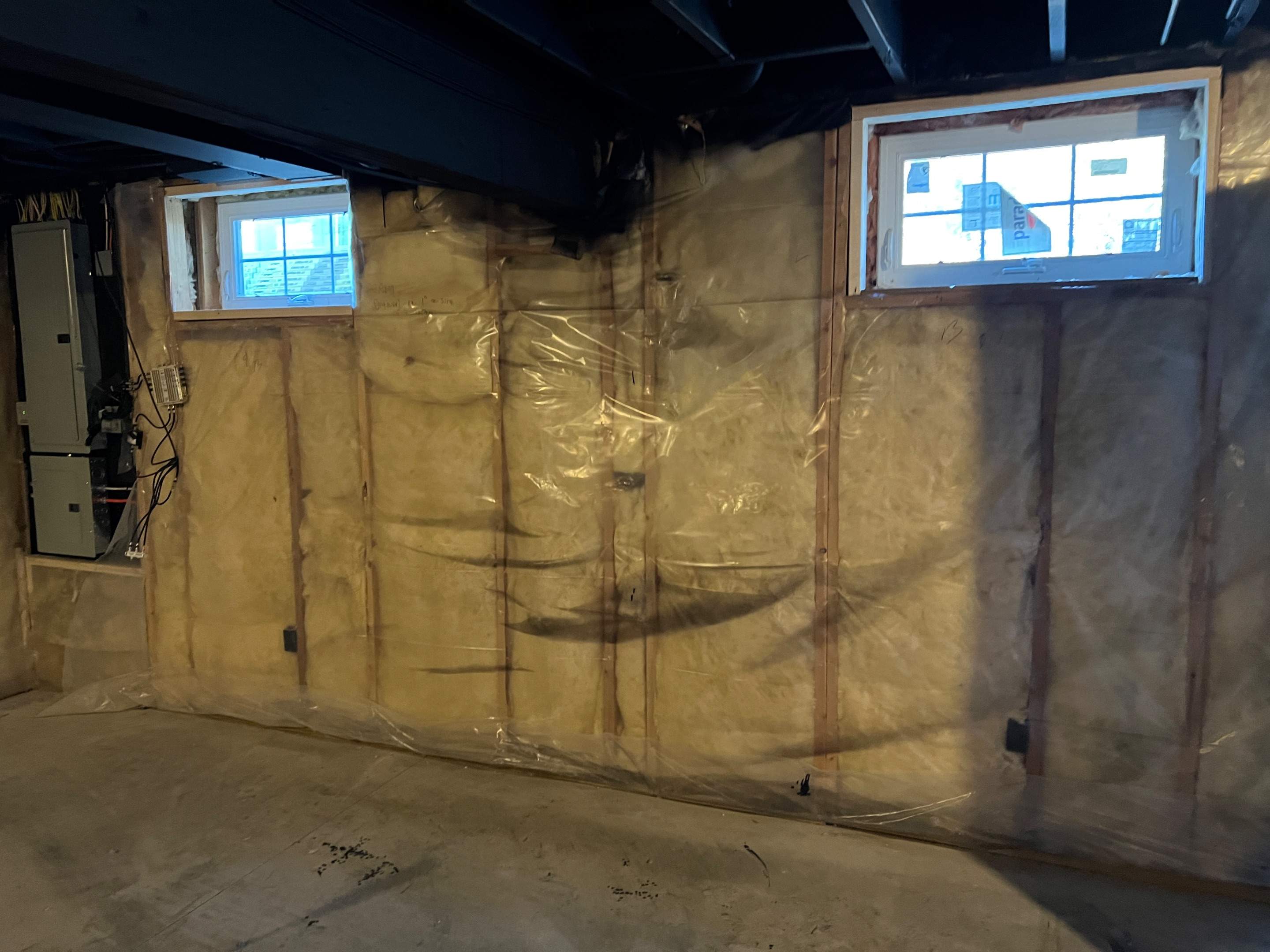 Basement Remodel w/ LVP Flooring & Exposed Ceiling by Chagnon Building & Remodeling LLC