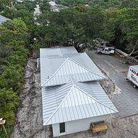 .032 Aluminum 1.5" Mechanical Seam Silver Metallic by Total Roofing System The Metal Roof Experts