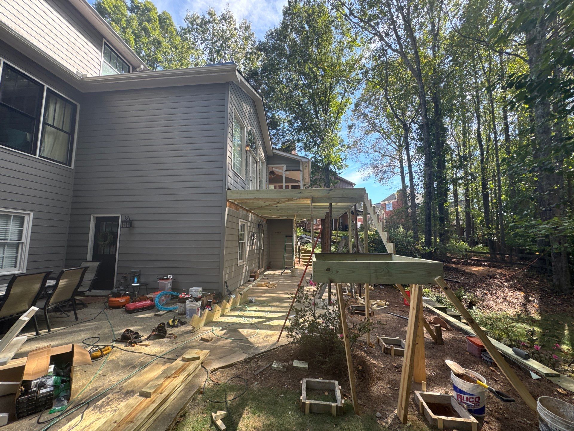 Custom Multi-Level Composite Deck and Sunroom Addition in Suwanee by Swift Home Renovations 