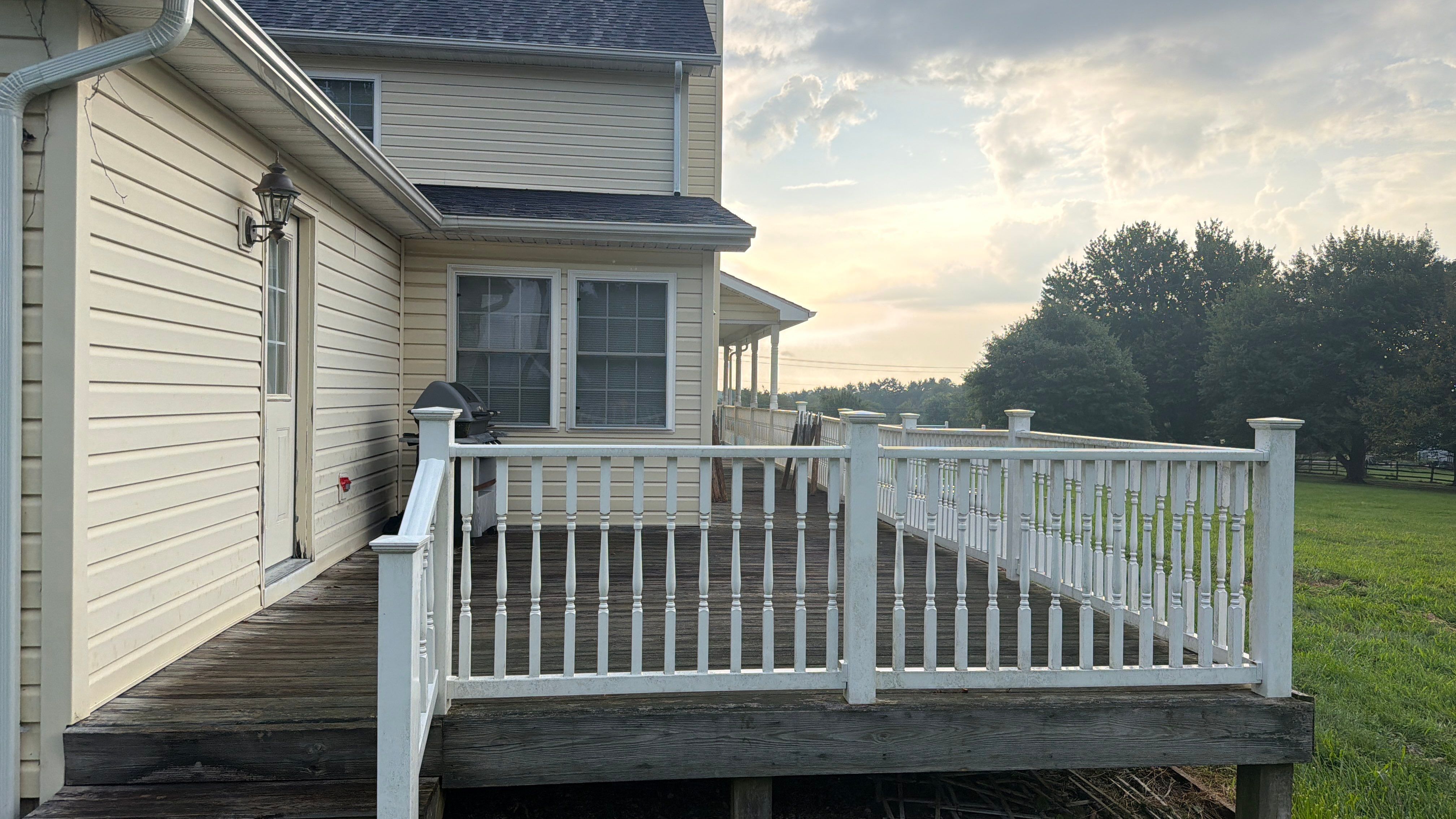 Vinyl Siding House Washing and Wood Deck Restoration in Carroll County by Baltimore Pressure Washers Inc.