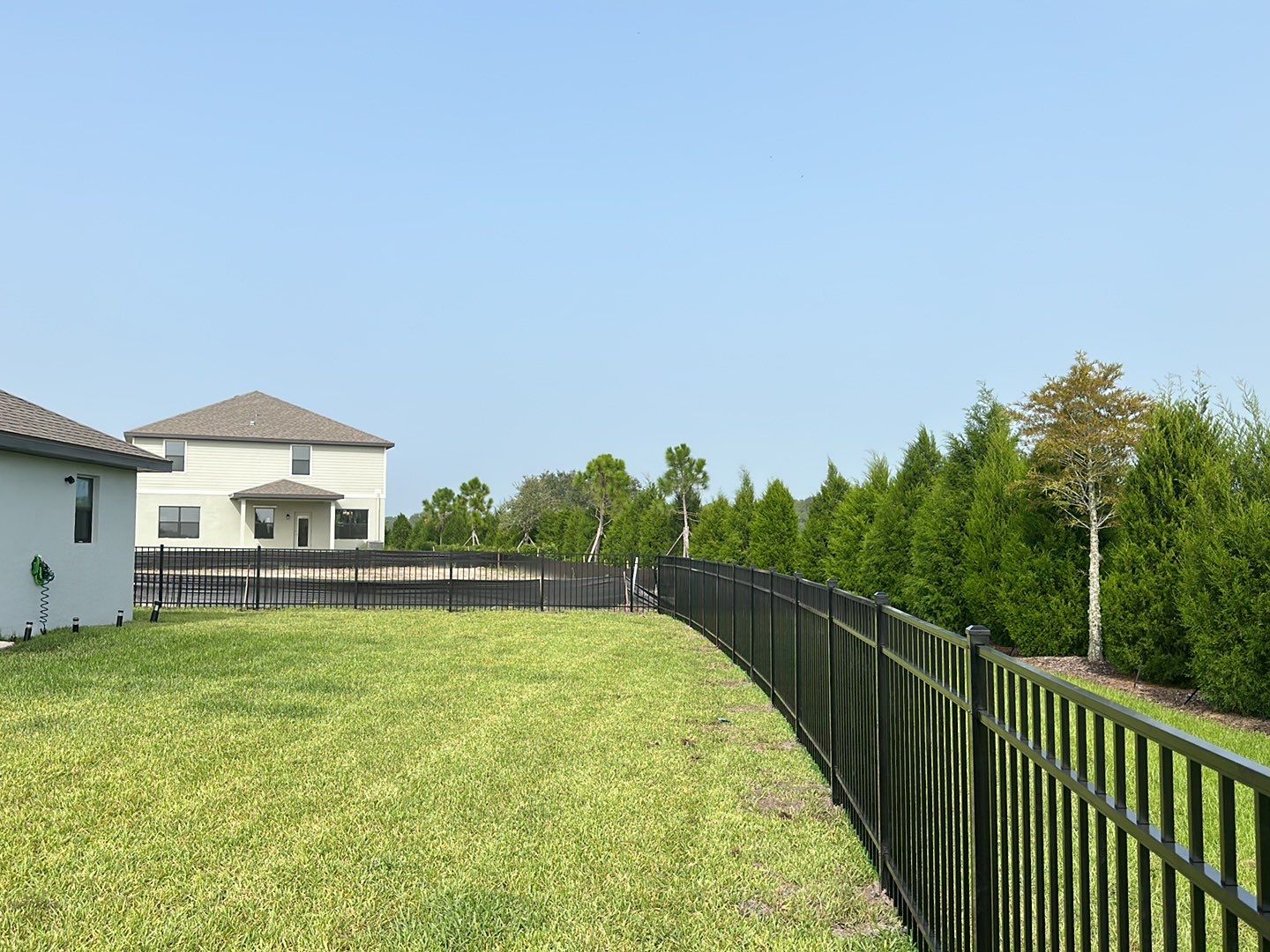 Aluminum Fence Installation using Black 3 Rail Aluminum Fence by Asap fence and gates, LLC
