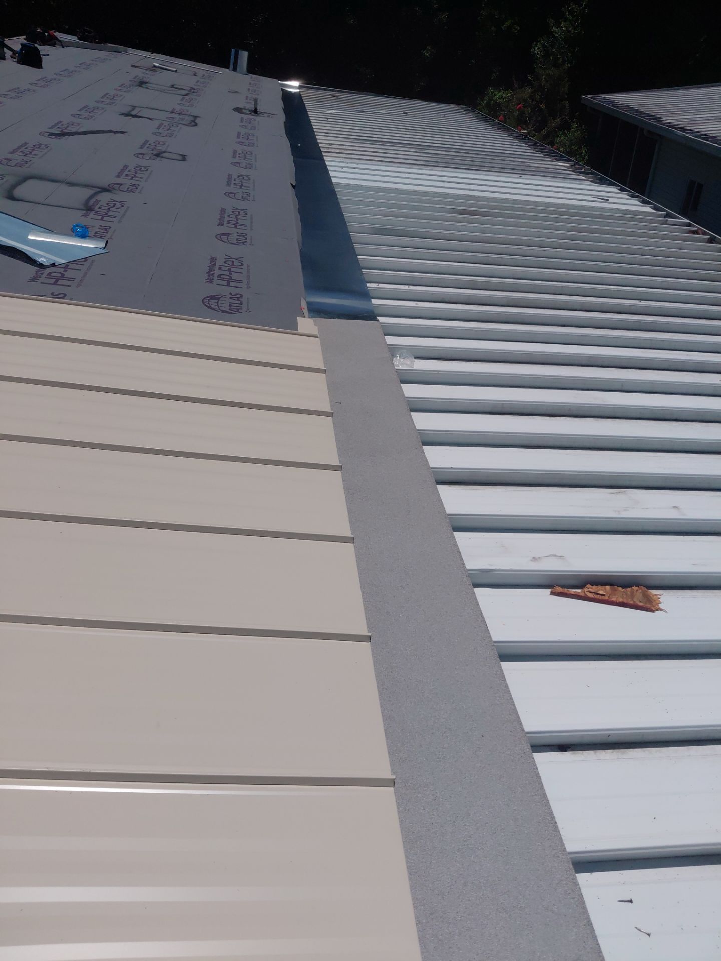 Orlando Residential Standing Seam Metal Roof Installation in Light Stone by Pinnacle Roofing Group