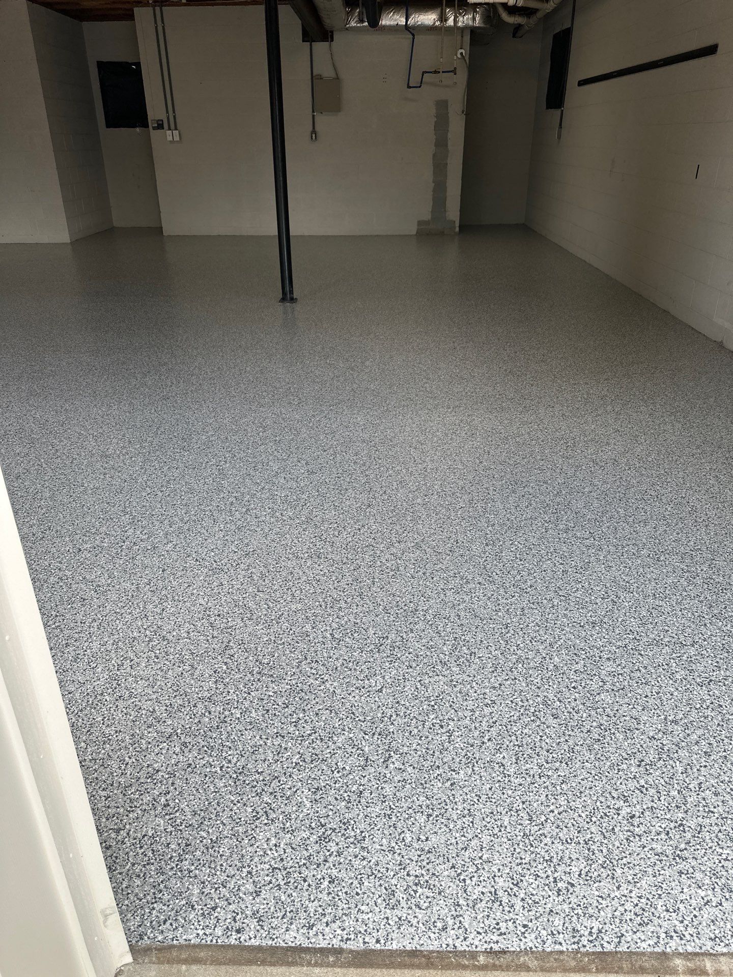 Garage Floor Coating using Gravel by My Garage Floor Guys