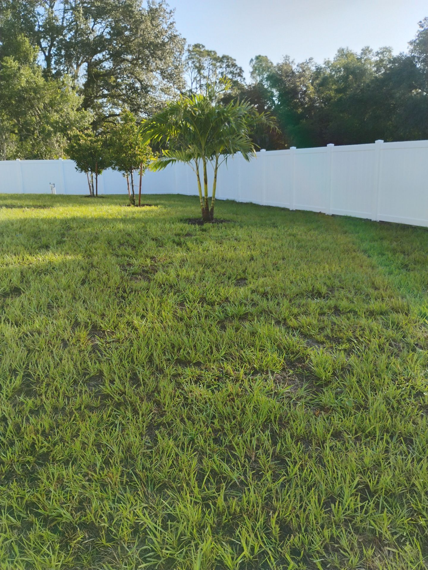 White Vinyl Privacy Fence with Gate Installation in North Port by True Fence LLC
