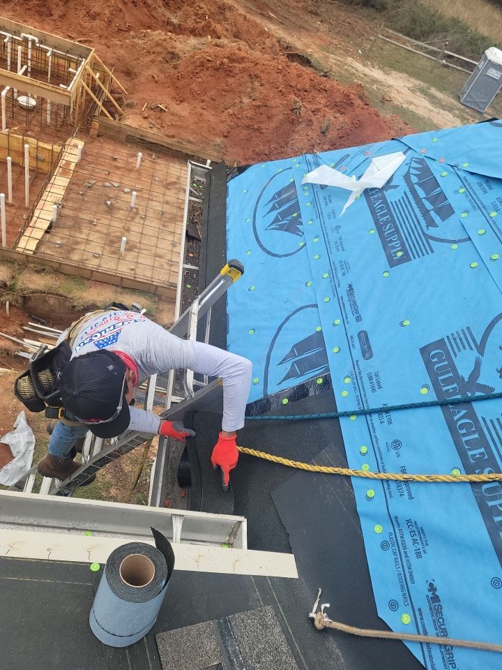 Residential Roofing Installation using Roof Replacement by American Roofing & Construction LLC