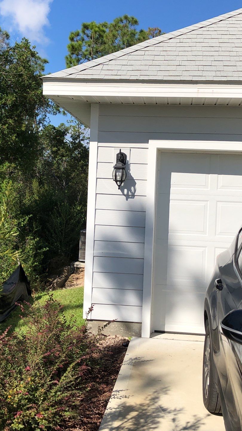 Seamless Gutter Installation using White by Gutter Professors