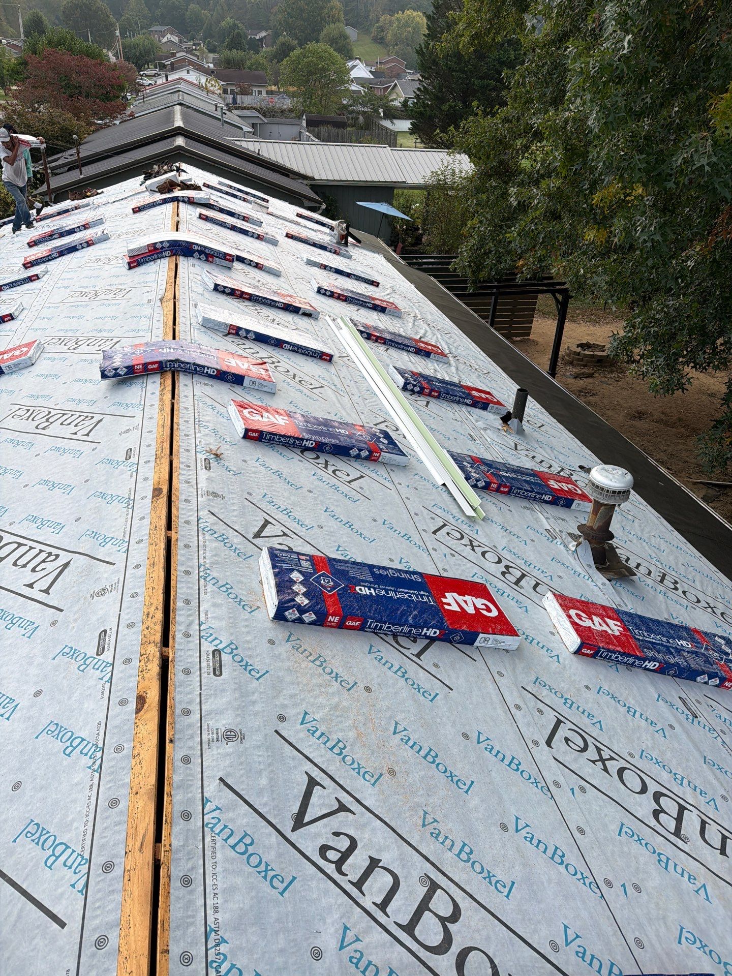 Residential Roofing Installation using GAF Timberline HDZ Charcoal by Rainstoppers Roofing