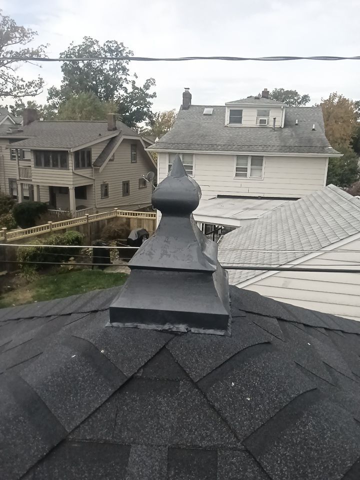 Residential Roofing Installation, Dec-tek walk-out porch roof, siding on garage by Absolute Roofing and Construction