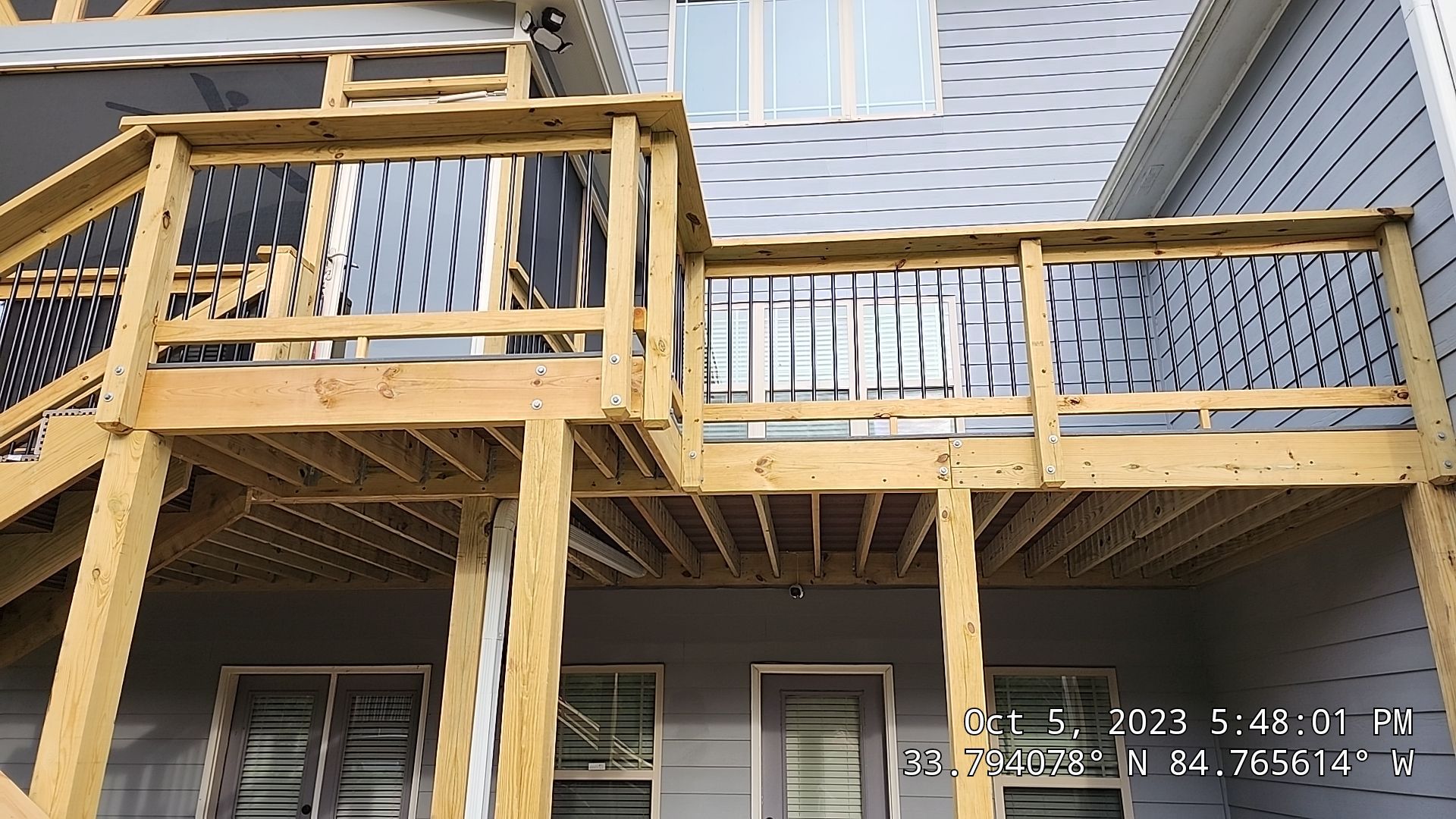 Fence Installation of Board on Board Capped Privacy by Titans of Timber Fence & Stain
