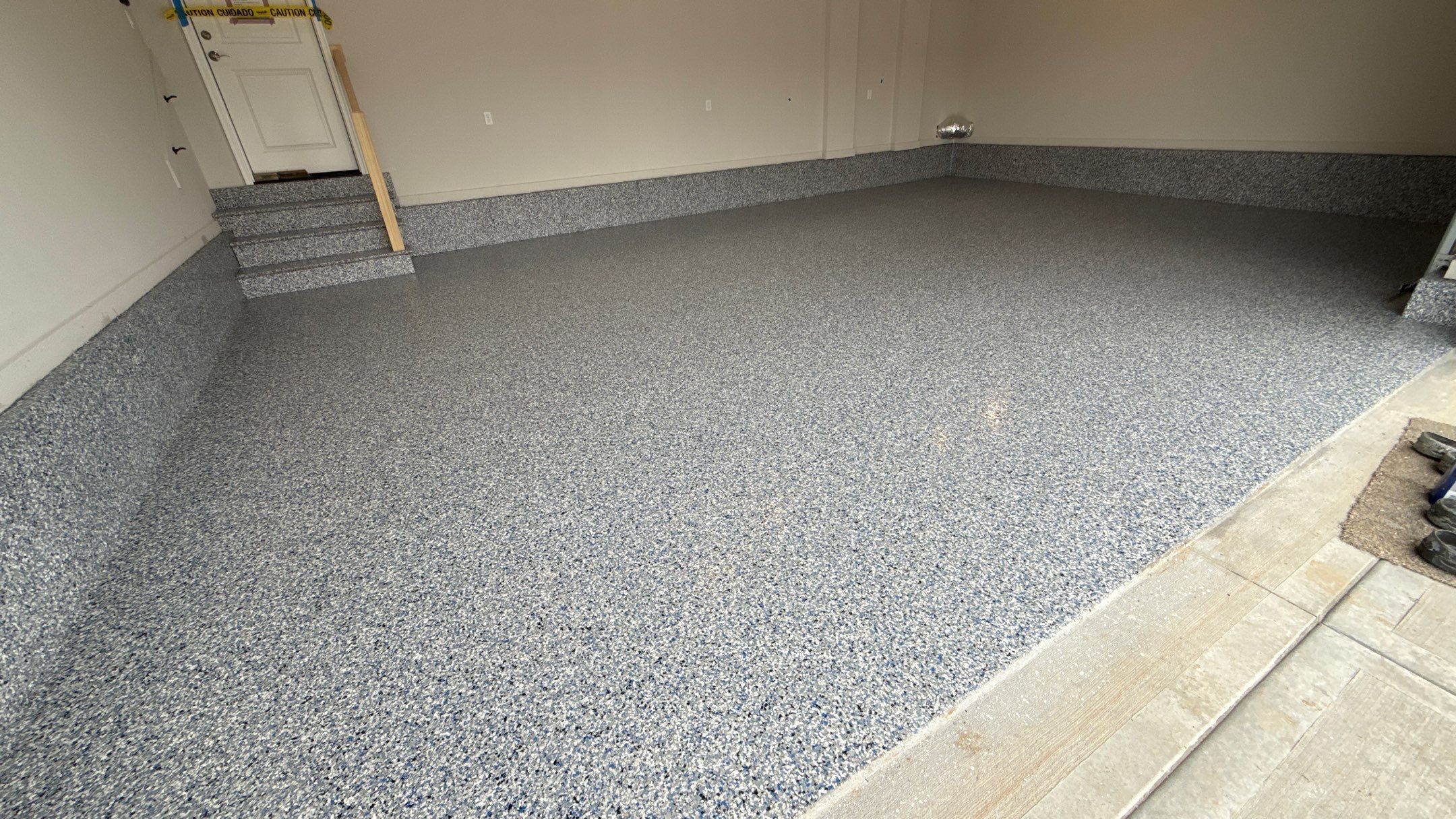 A Beautiful Comet Flake Floor  by Banner Garage