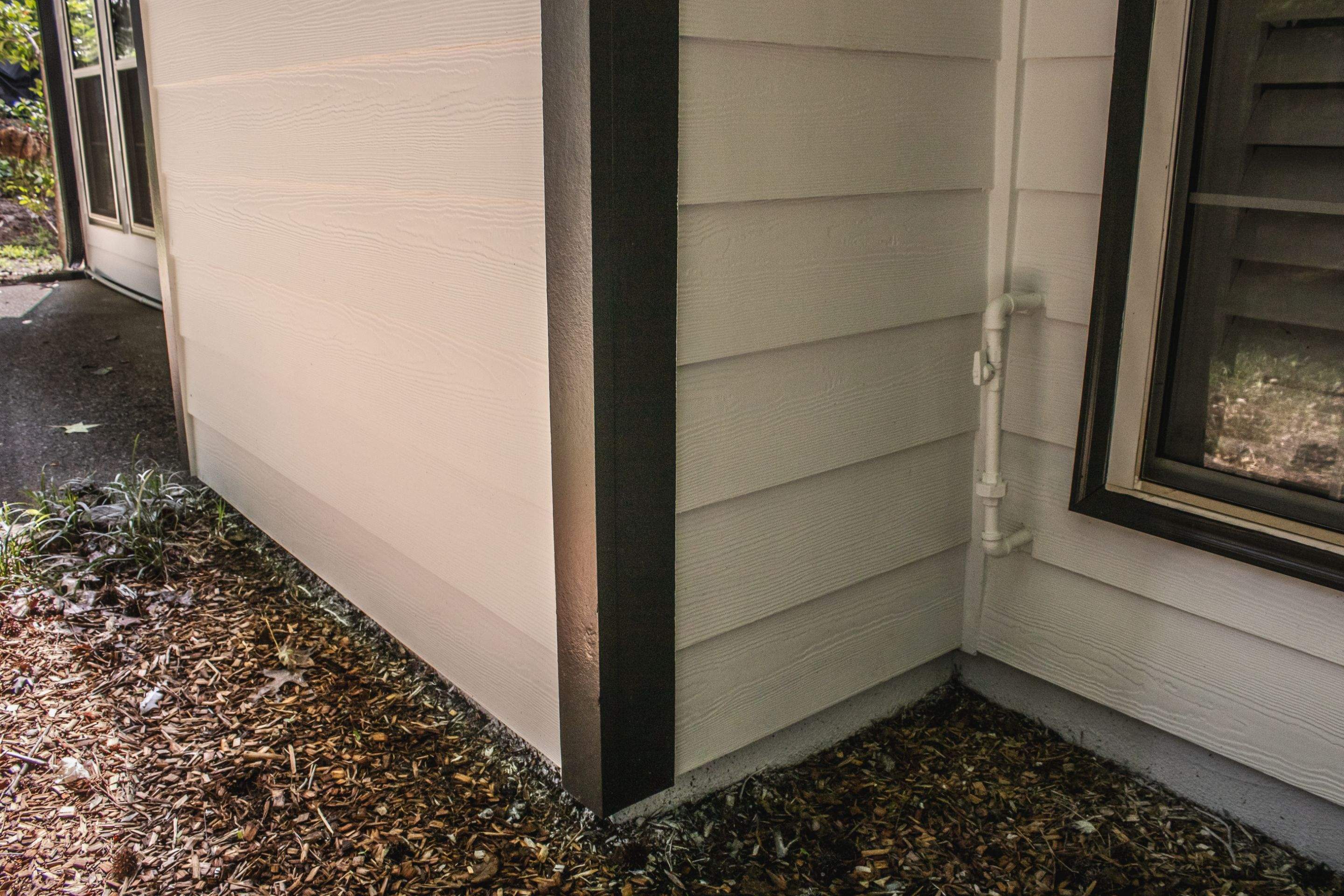 Alpharetta, GA Siding & Exterior Painting with Black Trim Before & After by Nelson Exteriors