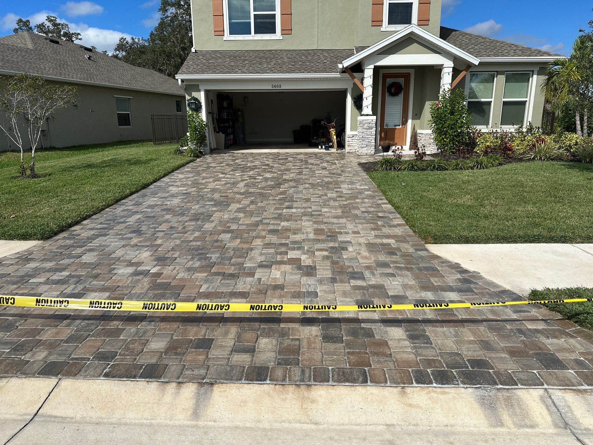 House Wash, Paver Driveway & Sidewalk Cleaning + Sanding & Sealing in Trevesta Community, Palmetto, FL by Sunshine AquaWash
