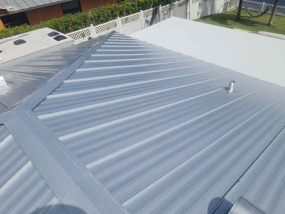Residential Roofing Installation using 1" Nail strip metal roof by BLUES BROTHERS ROOFING