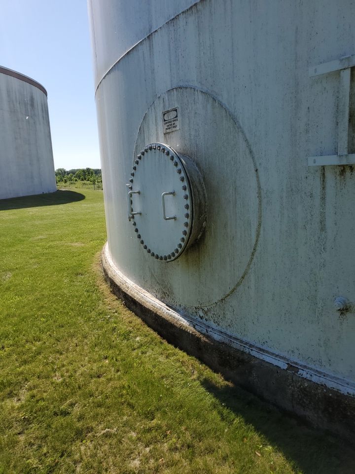 Water tank cleaning by Northern Power Washing LLC.