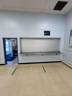 Commercial Door Installation using QMI 138''x58'' Roll up door