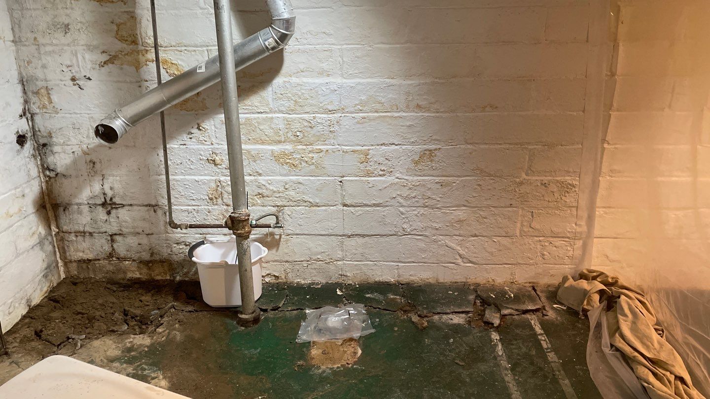 Sump Pump & Buried Discharge in Northeast Minneapolis by Waterproofing Northeast