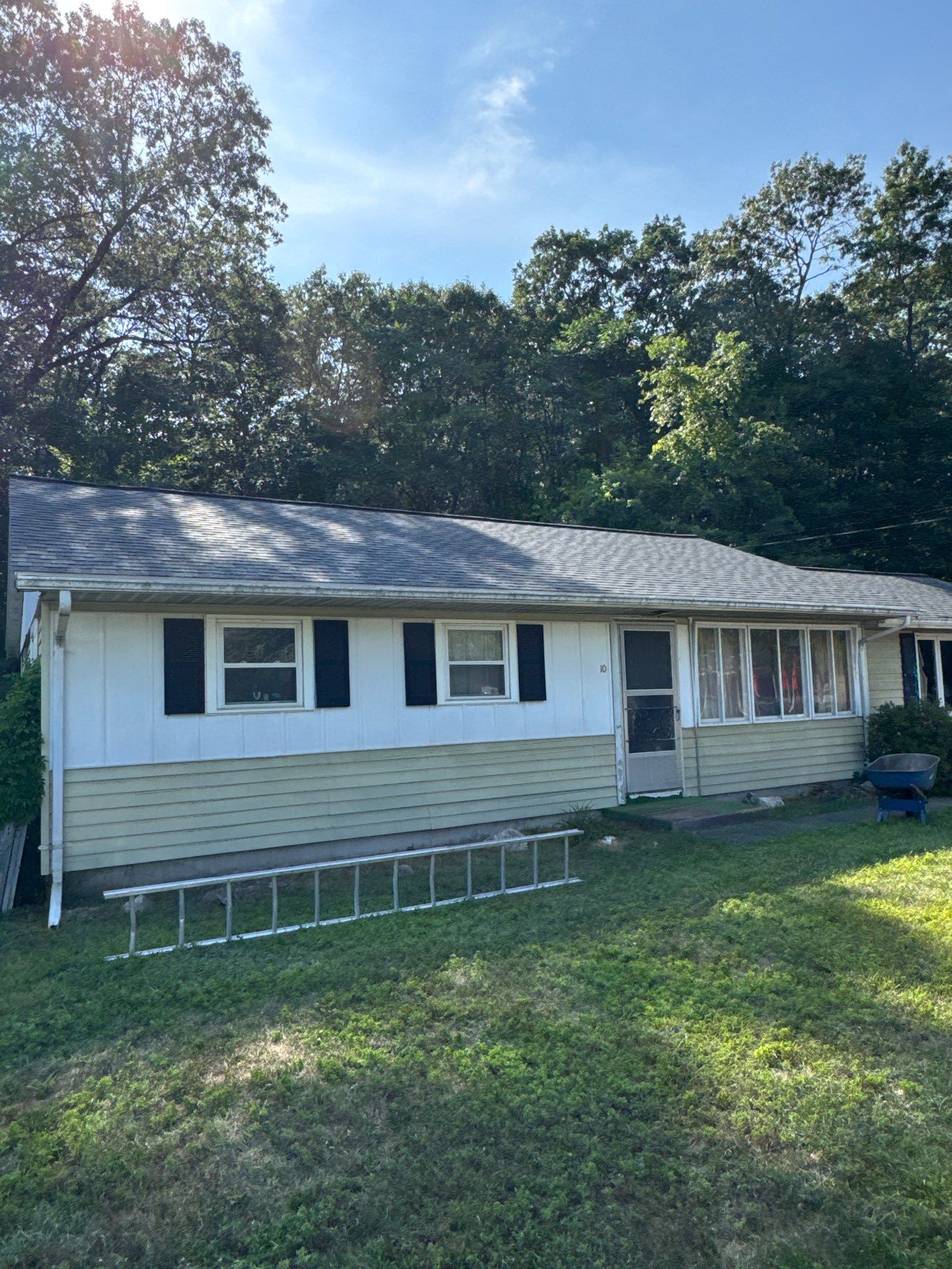 Onyx Black Roof Transformation in Maynard, MA by Mighty Dog Roofing of Greater Middlesex County