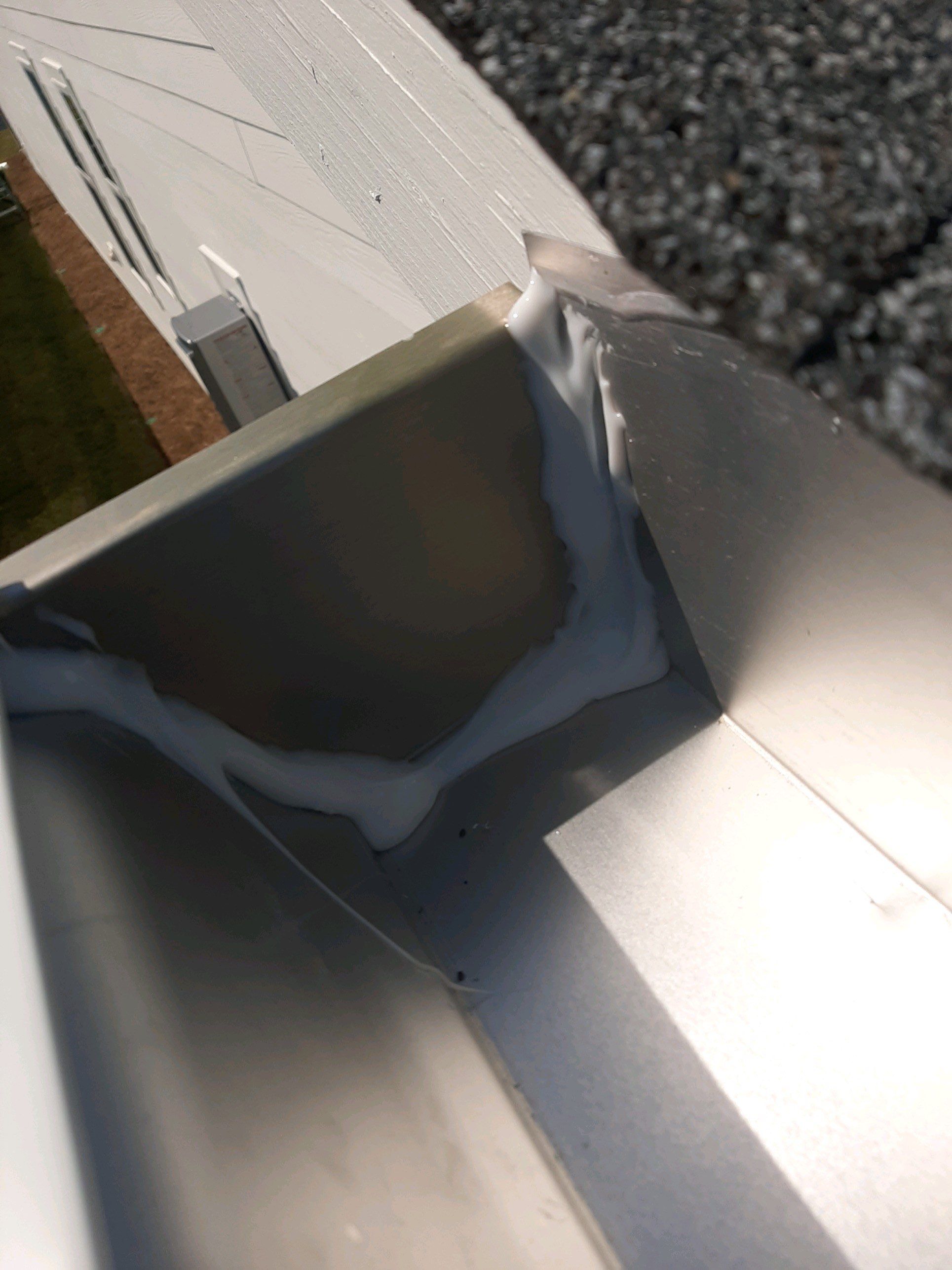 Gutter Installation Using White K-Style Aluminum Seamless Gutters by Gutter Professors