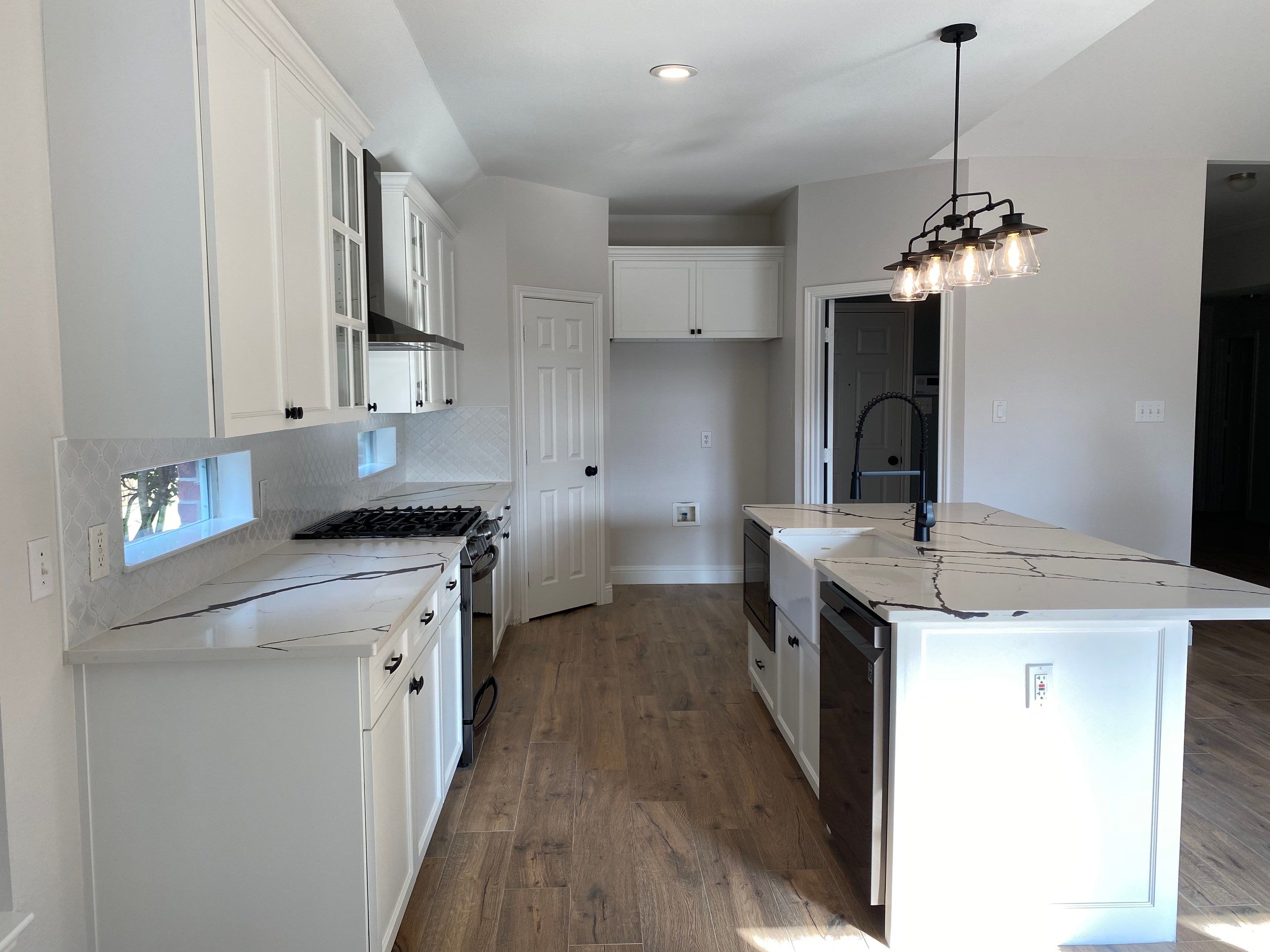 Custom cabinetry Kitchen Remodel by SLM General Contractors & Roofing
