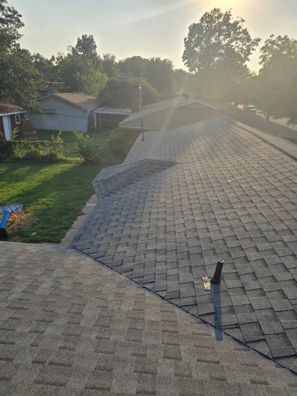 New Roof and Exterior Paint by Harvey Roofing & Construction
