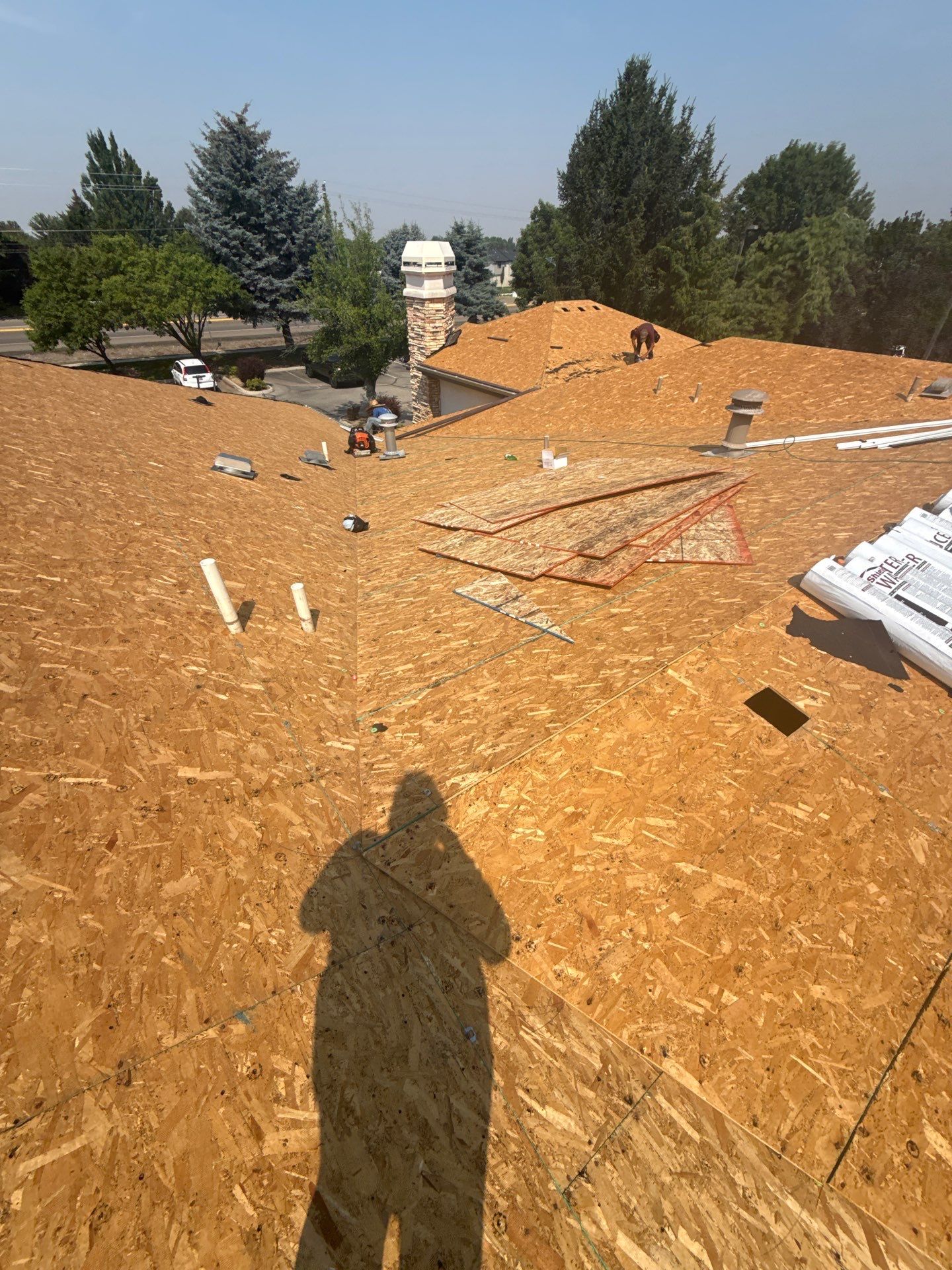 Boise Commercial Roof Replacement with Brown Architectural Shingles by Olive Roofing