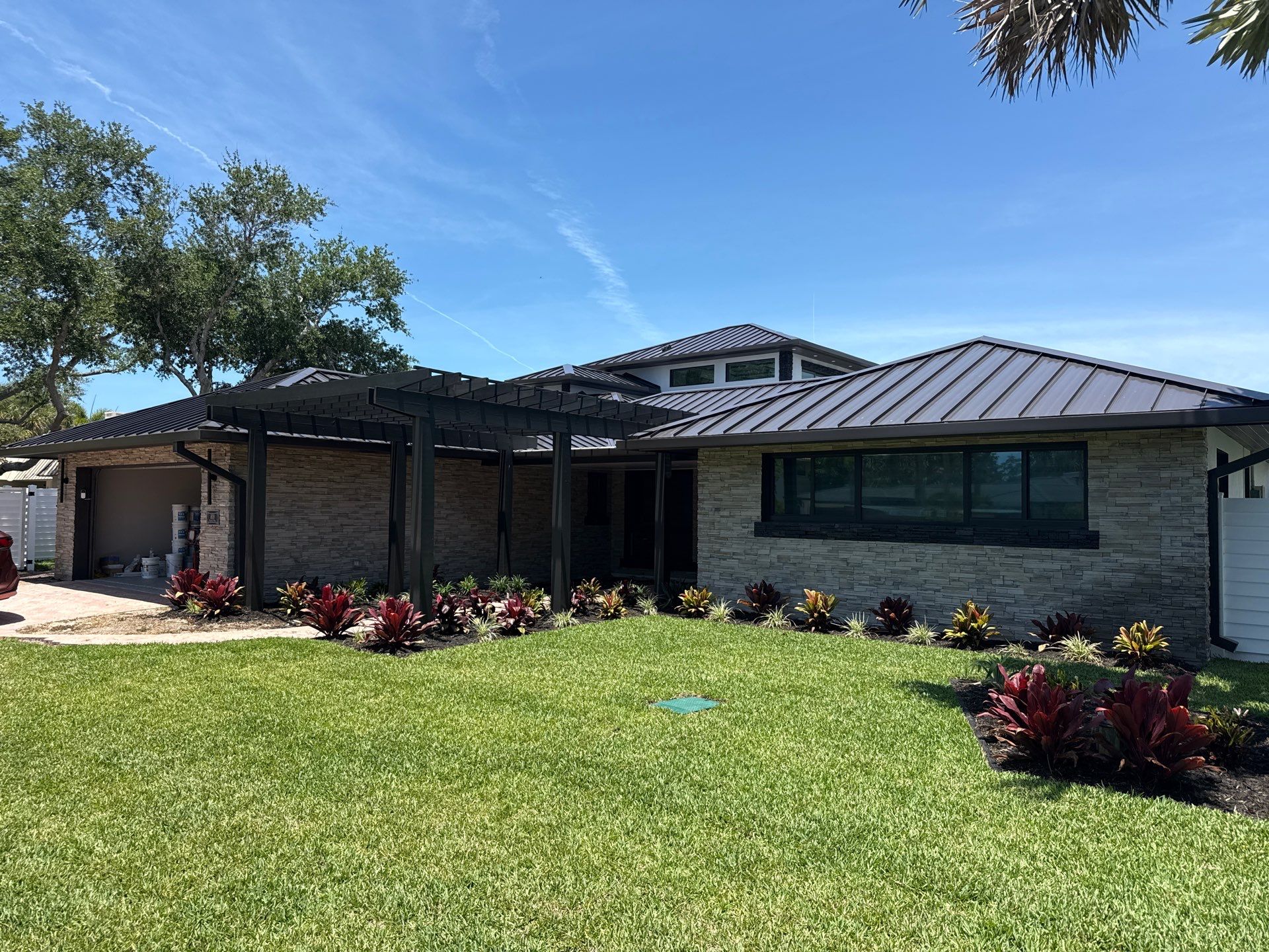 7-Inch Smooth Box Seamless Gutters using black seamless gutters in Siesta Key Fl by Gutter Professors