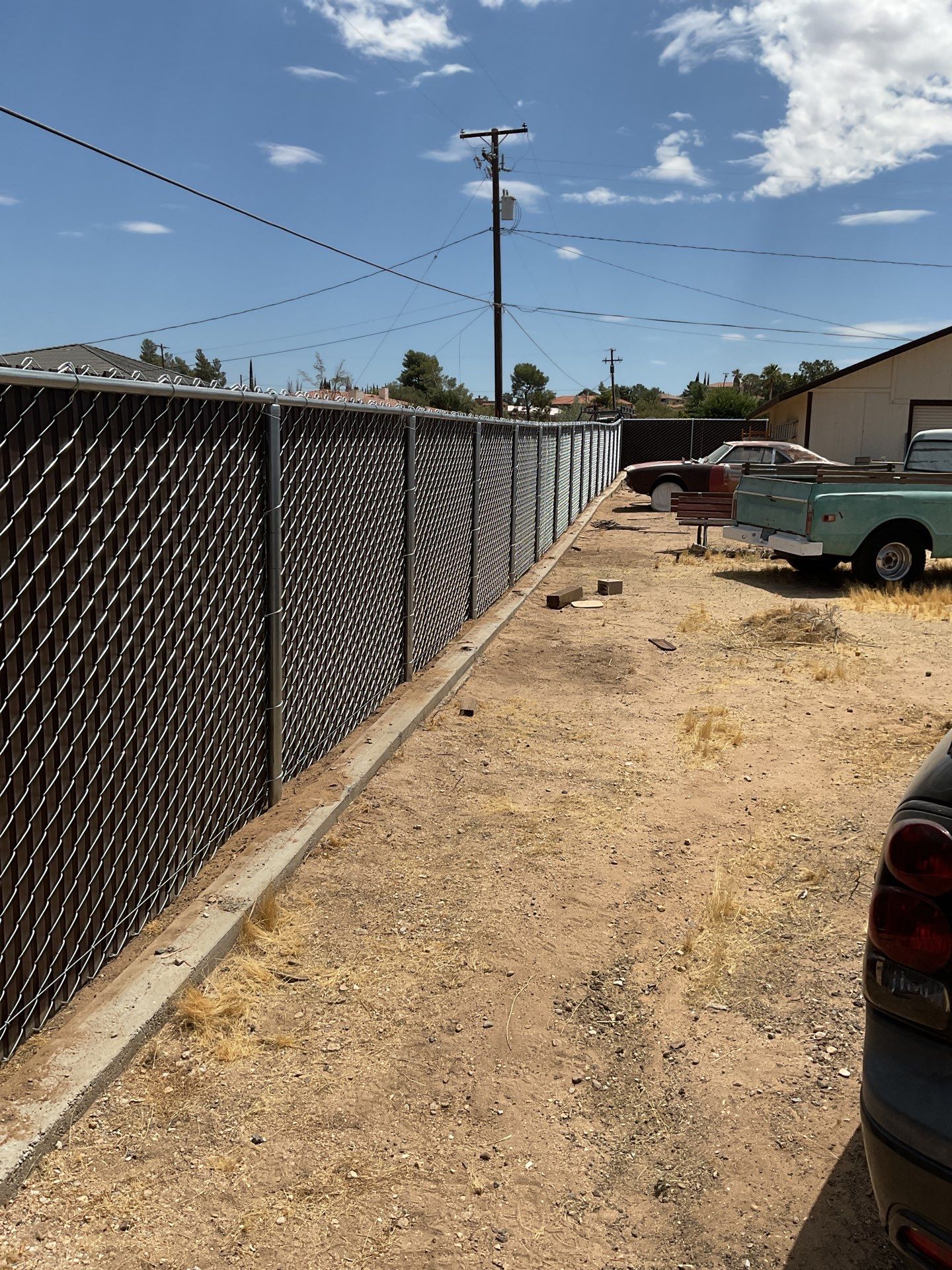 Dark Brown Privacy Chain Link Fence by Fence Guys Inc.