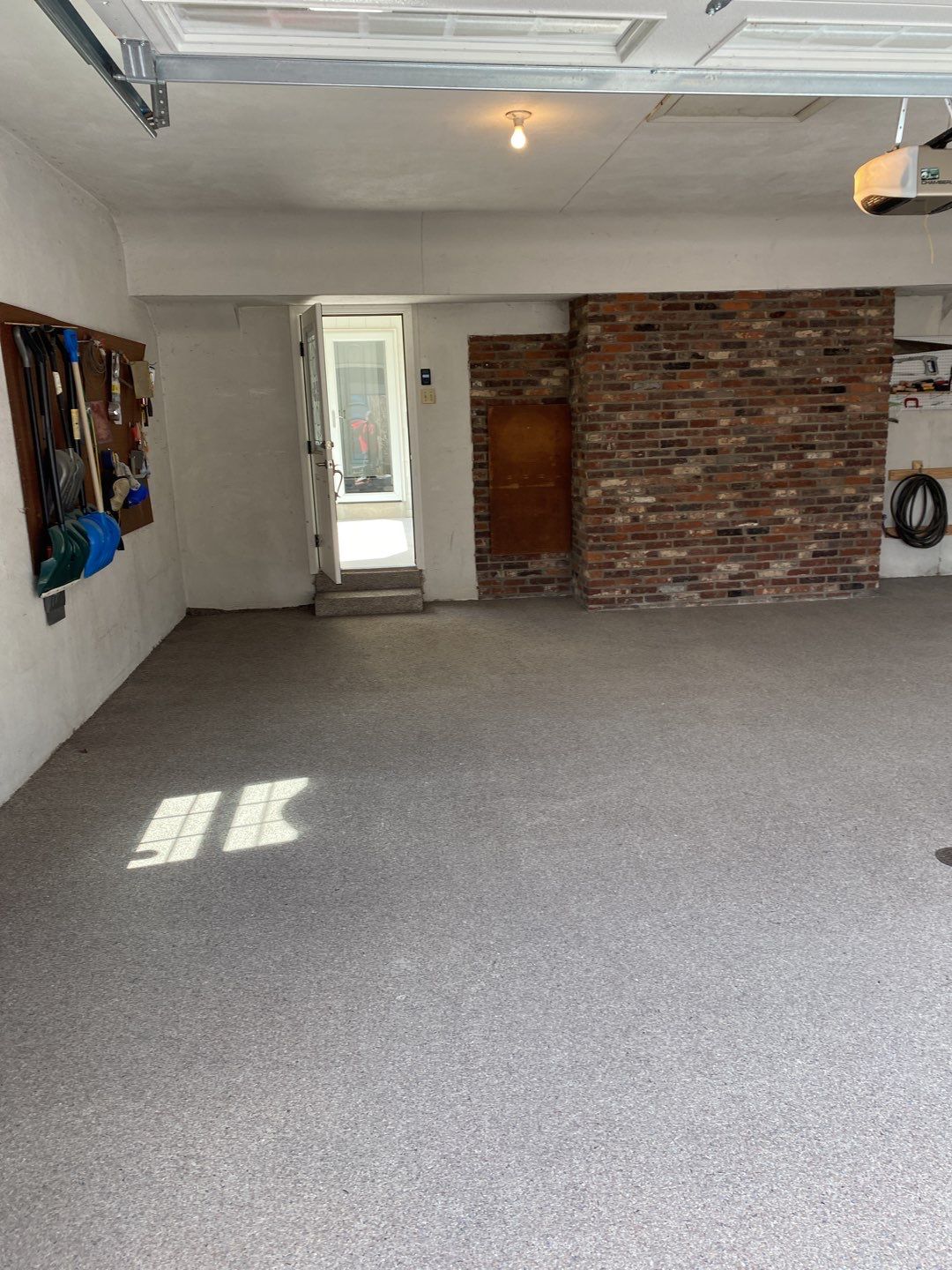 Large Patio + Garage Project in Pittsburgh by Floors in a Day, Inc