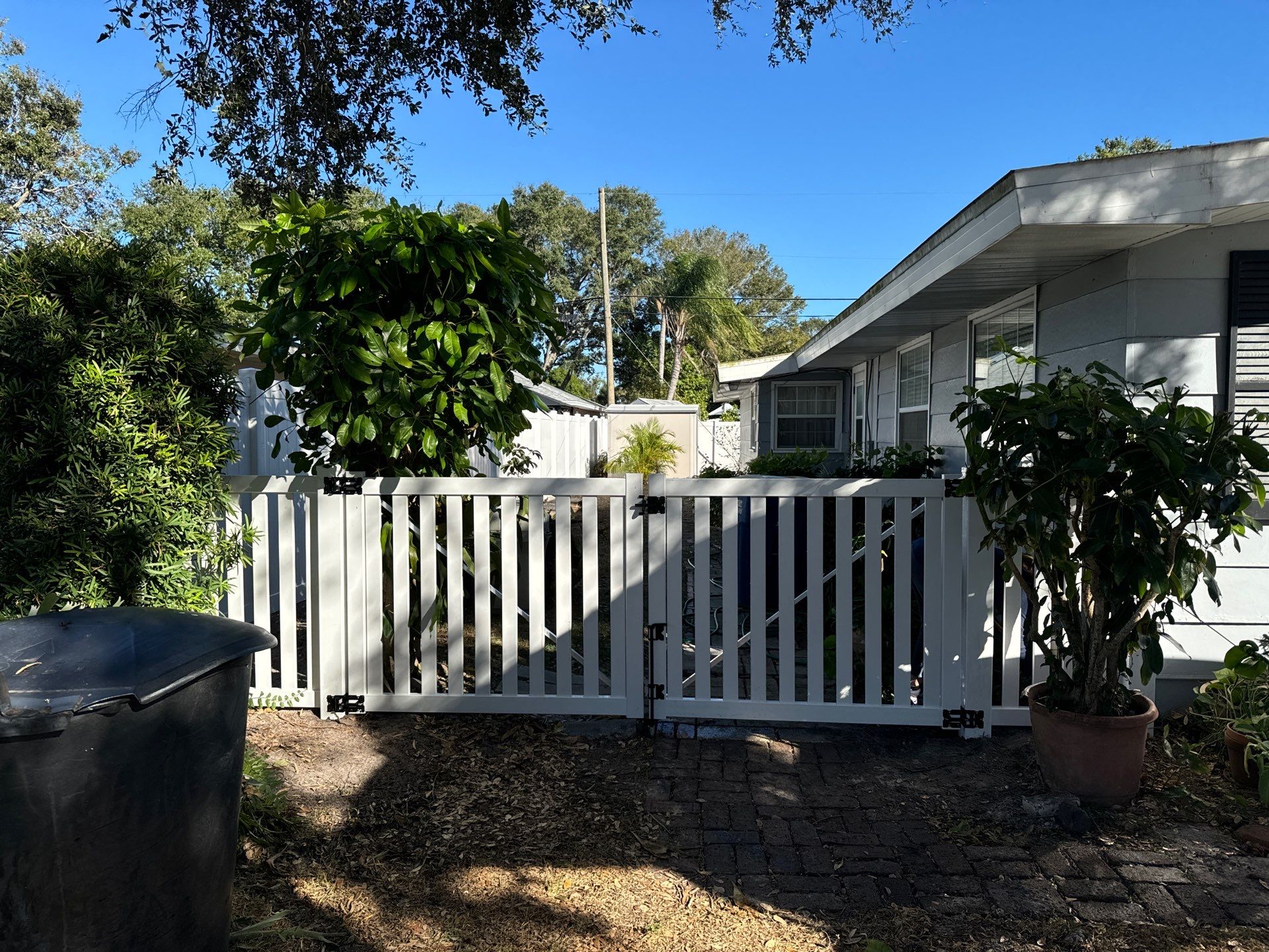 Vinyl Fence Installation using 6Ft White Vinyl Fence with a 4Ft White Picket Fence by Asap fence and gates, LLC