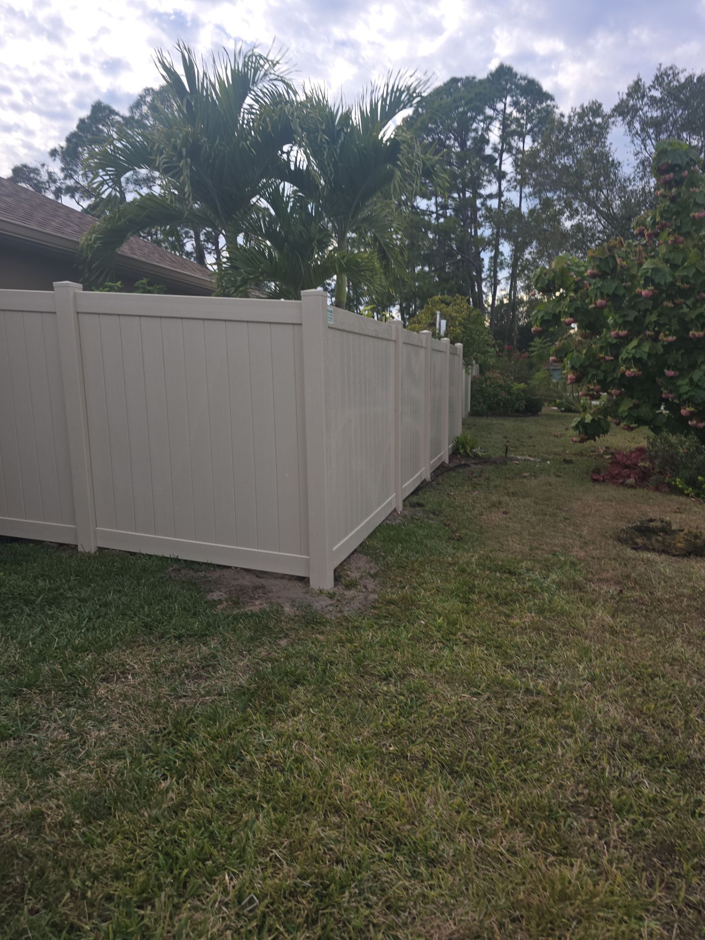 Tan Vinyl Fence in North Port by True Fence LLC