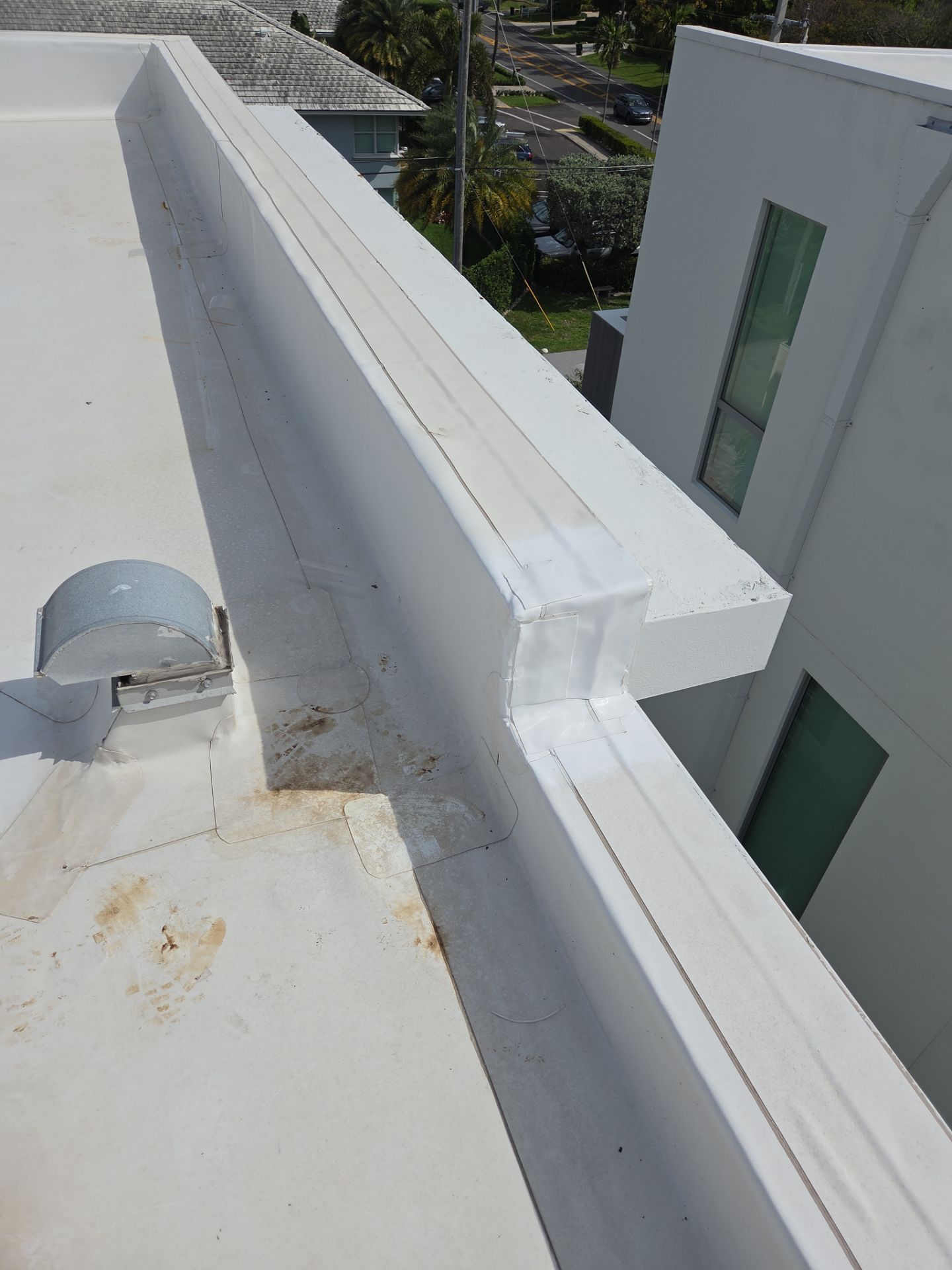 TPO Flat Roof Repair and Window Sealing in Delray Beach by Aastro Roofing