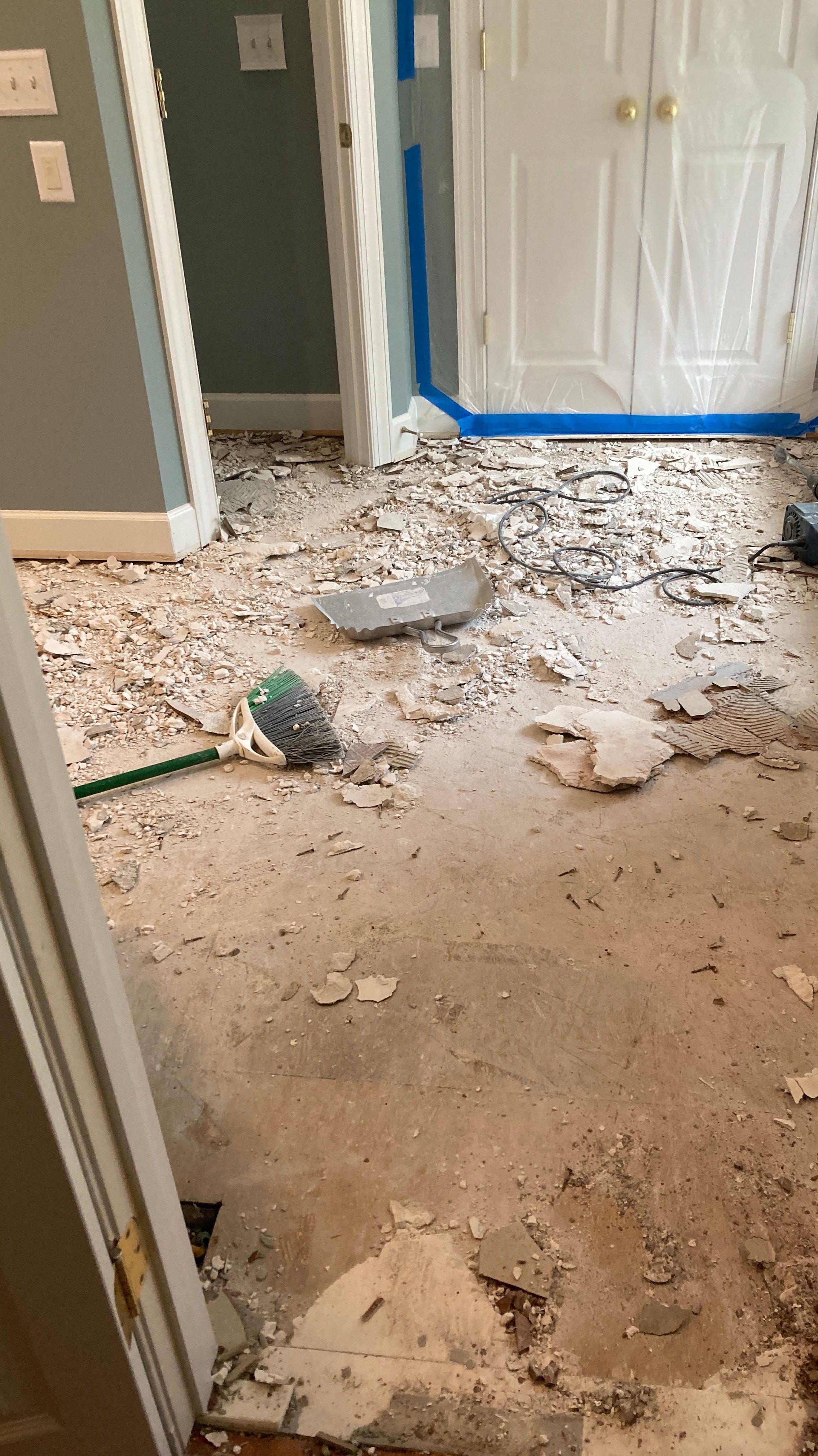 Lovely marbled bathroom floor  by Footprints Floors of Nashville