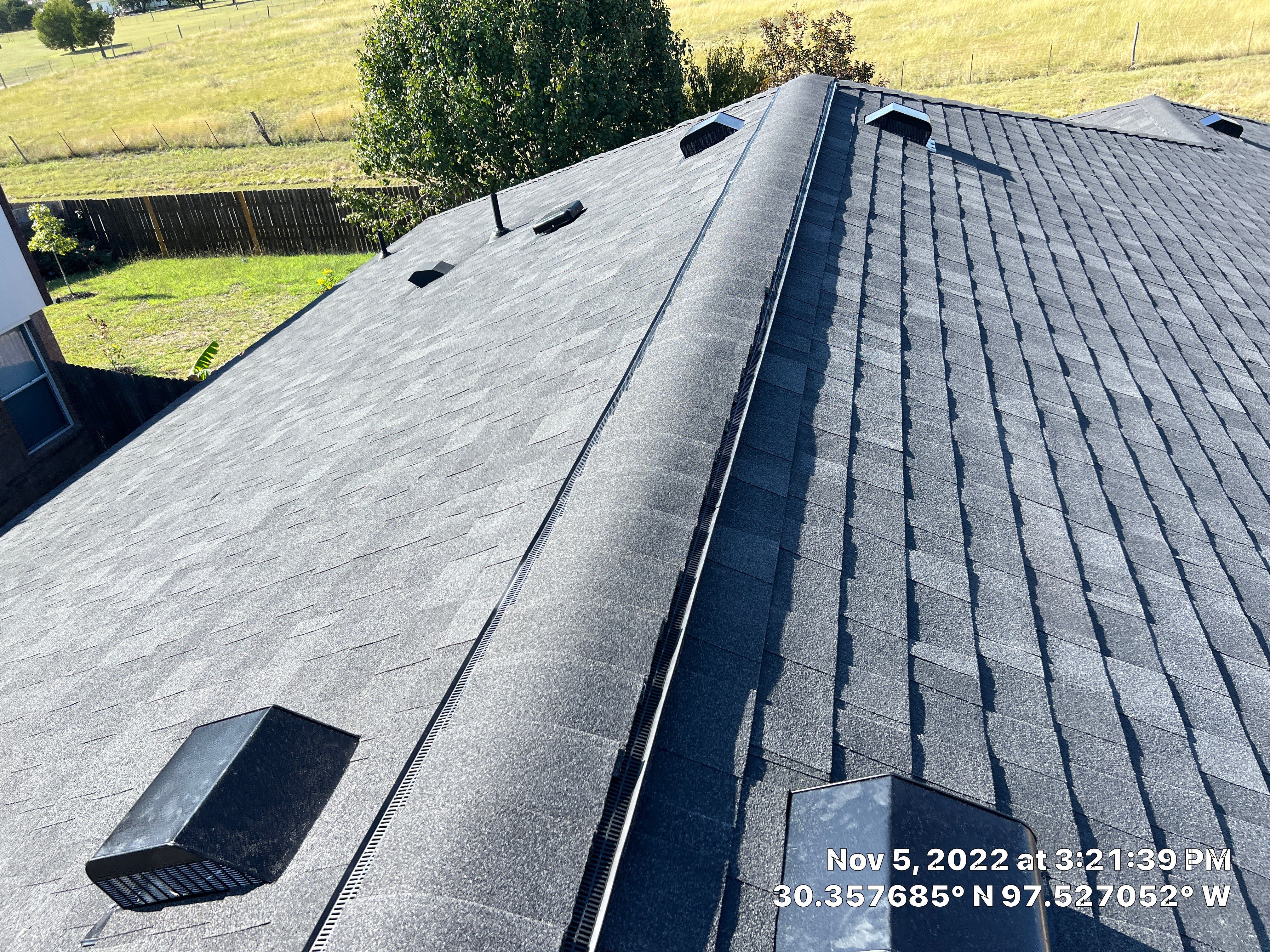 Asphalt Shingle Roof Replacement and Window Glazing in Manor by Caliber Restoration LLC