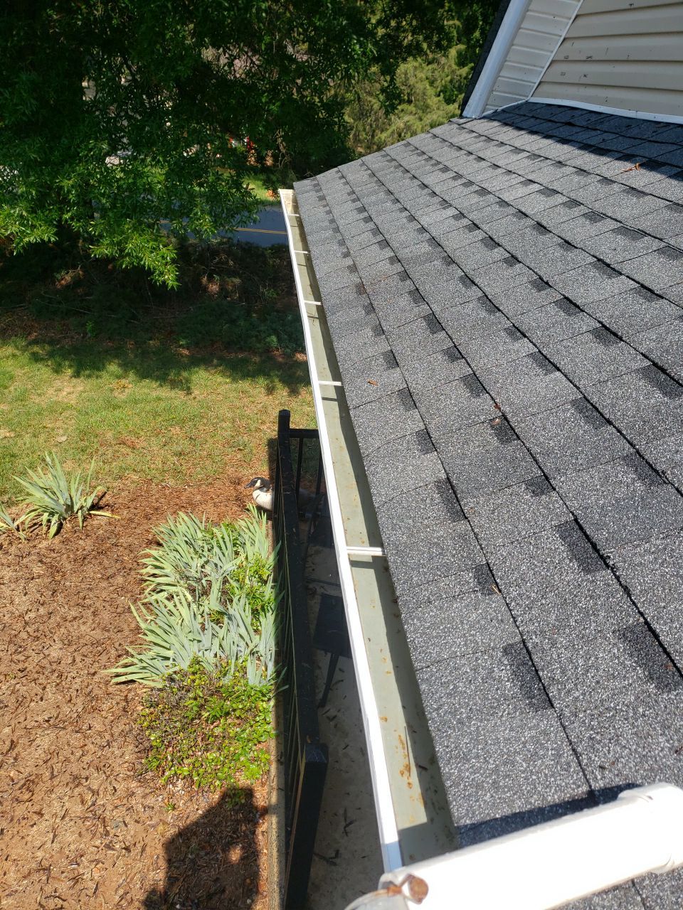 Gutter Cleaning using water by G&H Home Tech Pros LLC