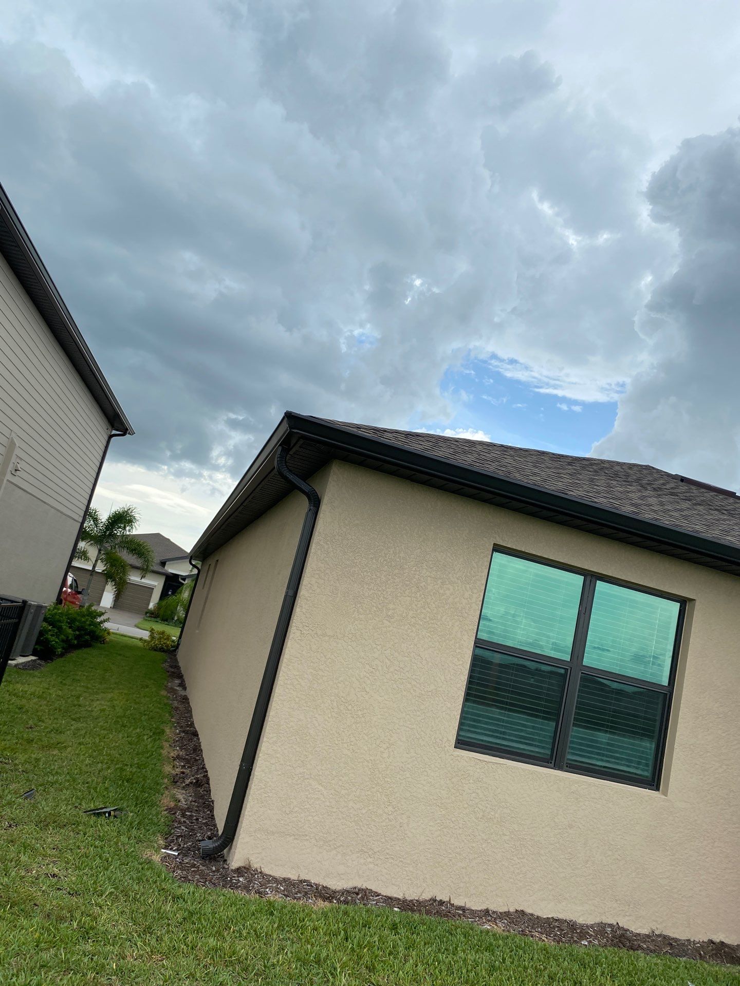 Brown Seamless Gutters for Homes in Fort Myers by Gutter Professors