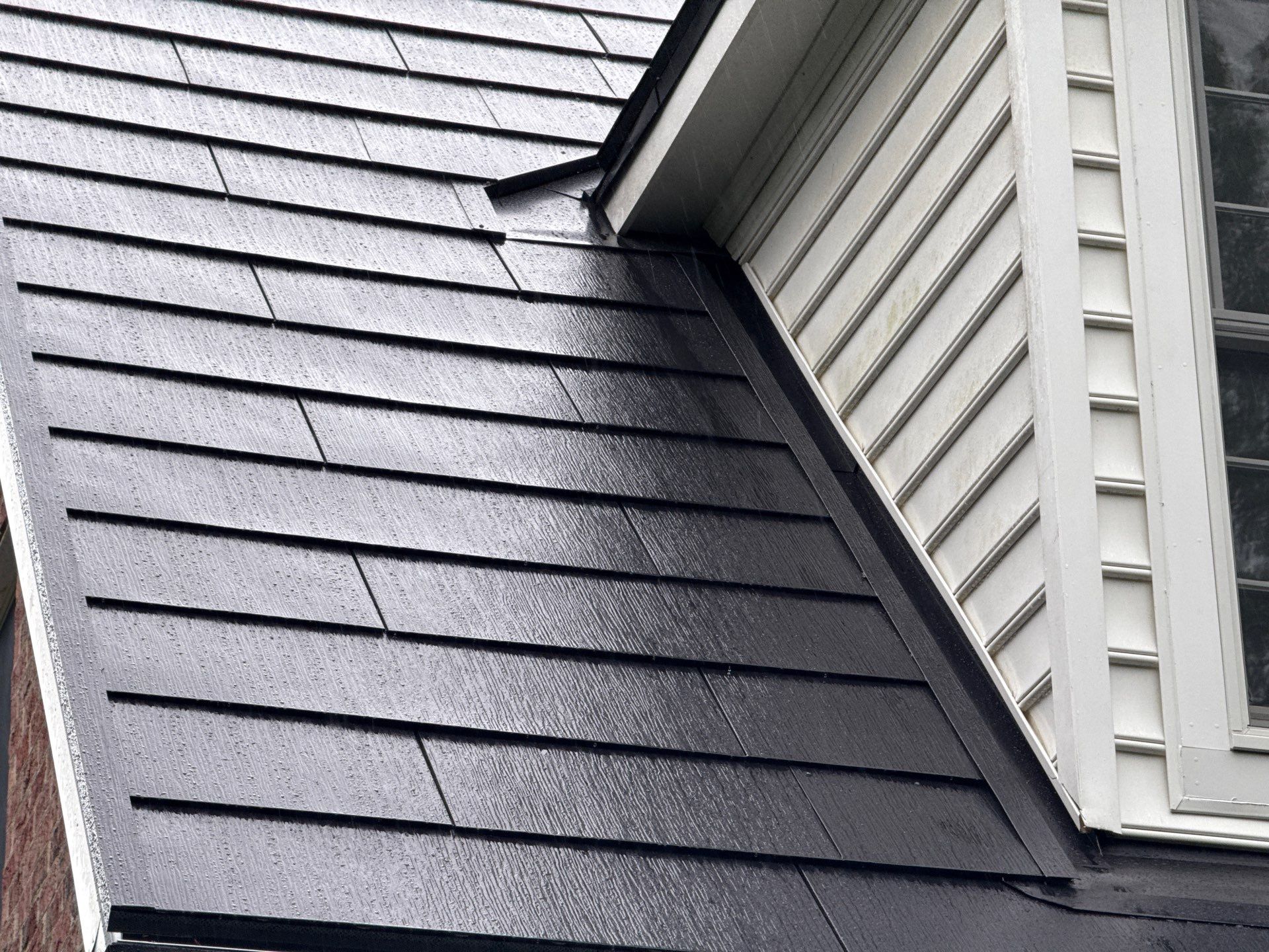 Tesla Solar Roof Replacement by American Home Contractors