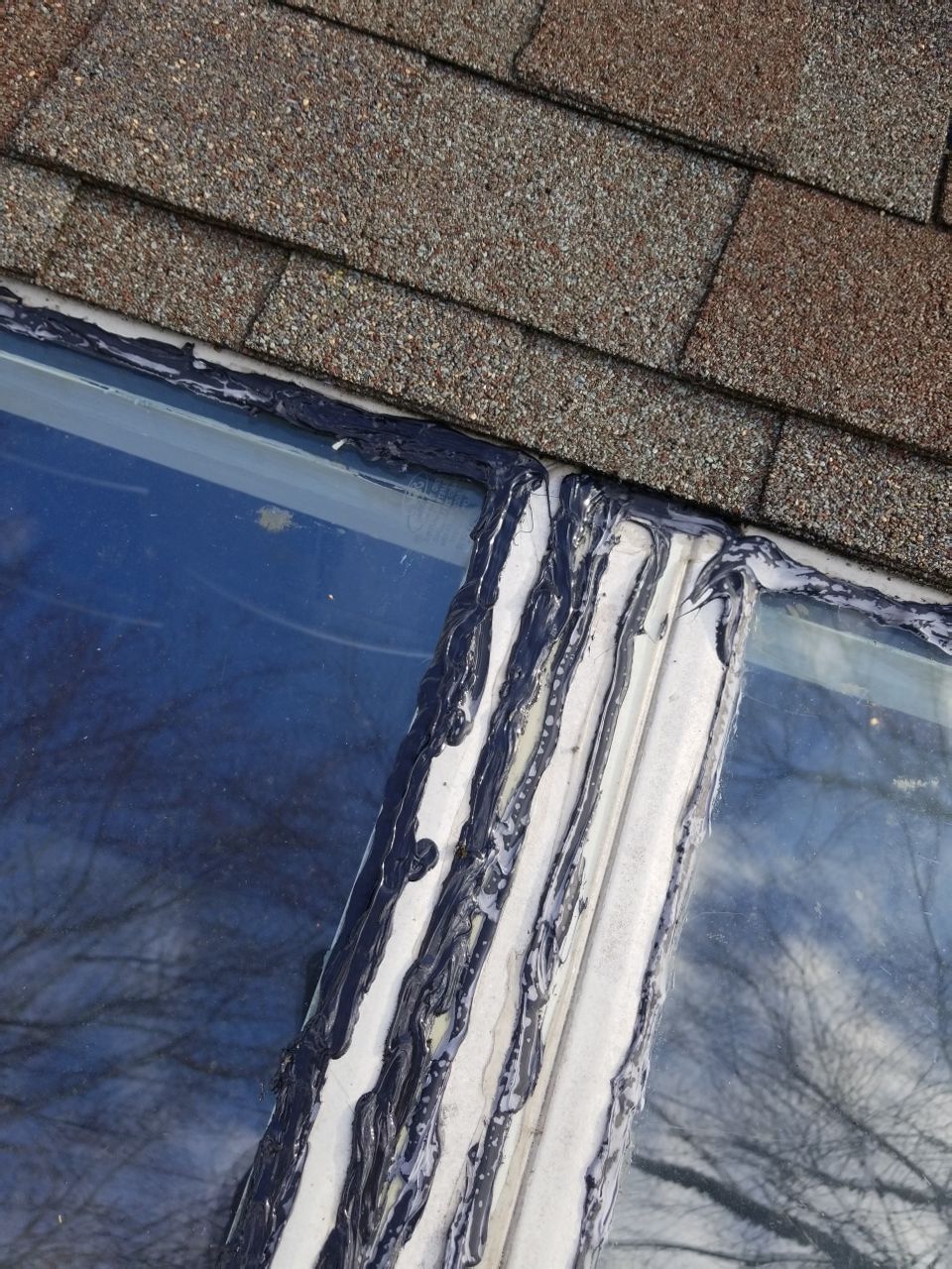 Skylight and Gutter Replacement by American Home Contractors